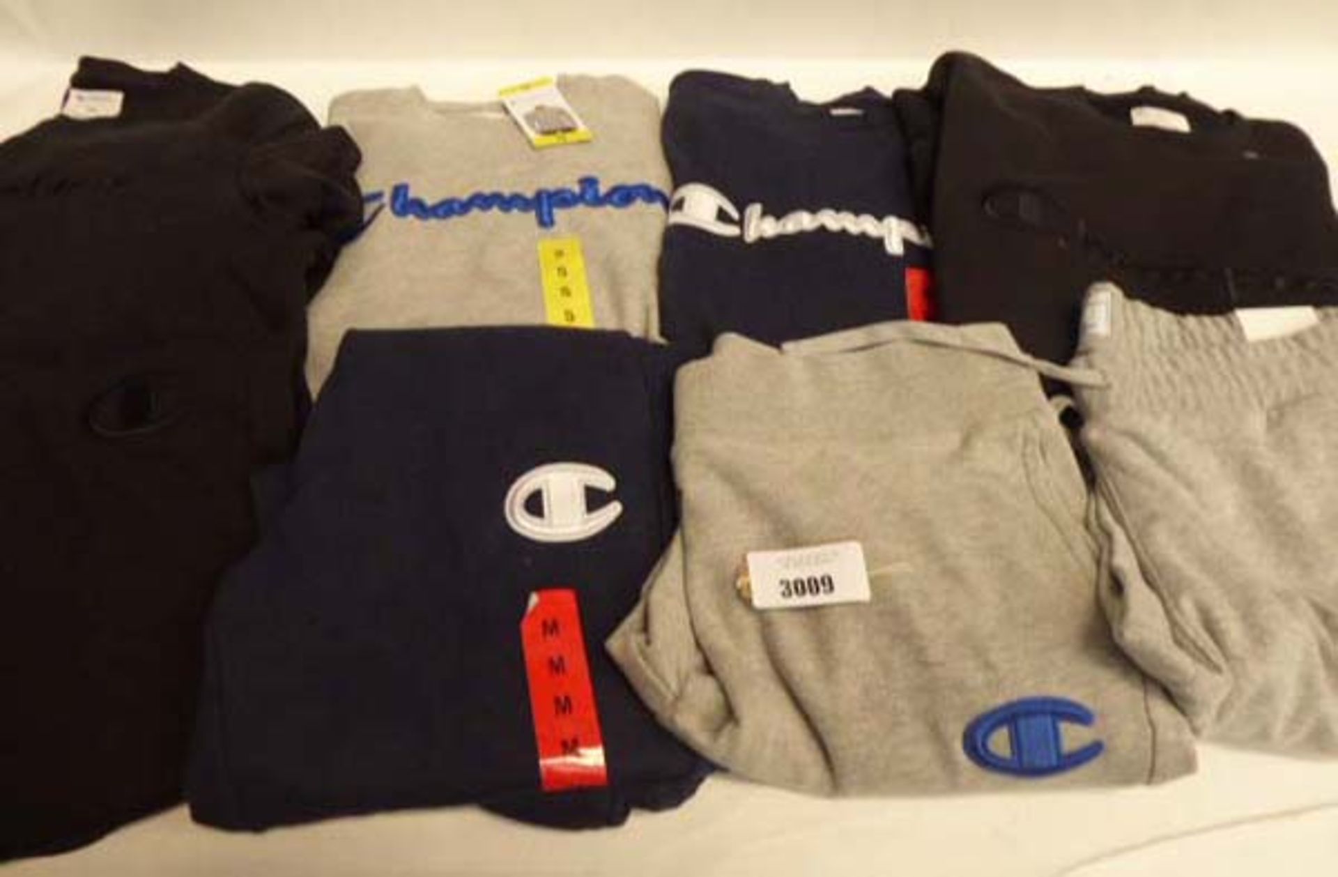 Selection of 8 items of Champion clothing, some used