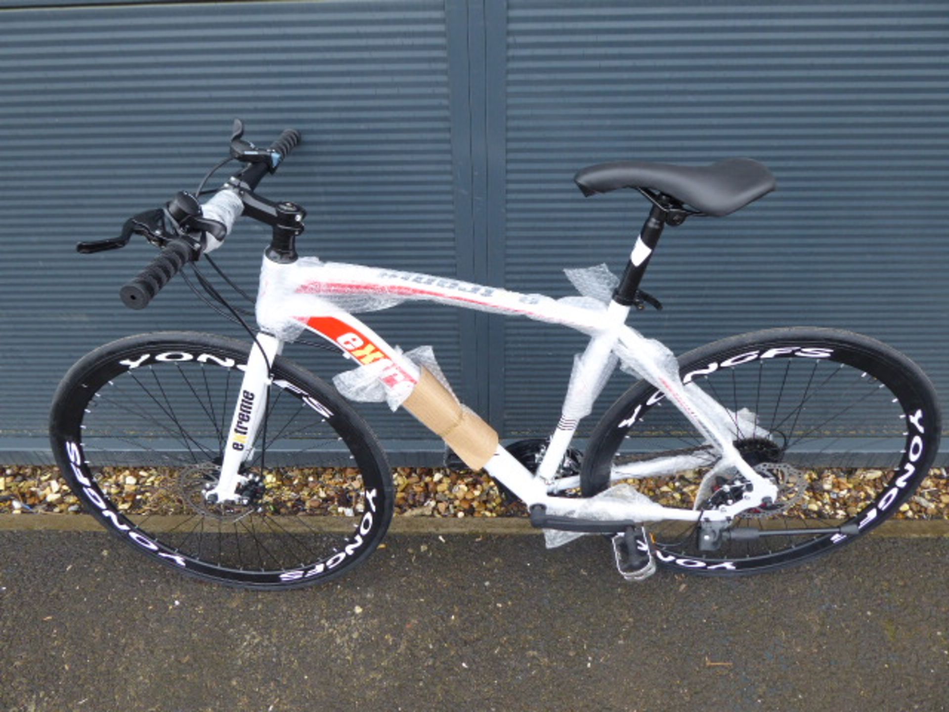 White and red Extreme Shimano geared road bike