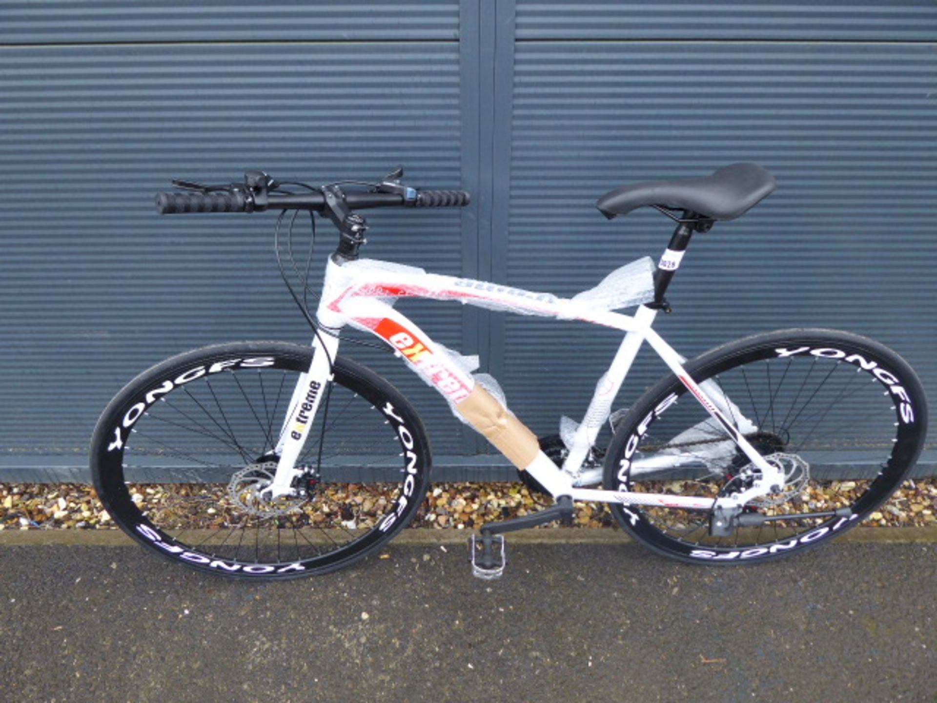 White and red Extreme Shimano geared road bike