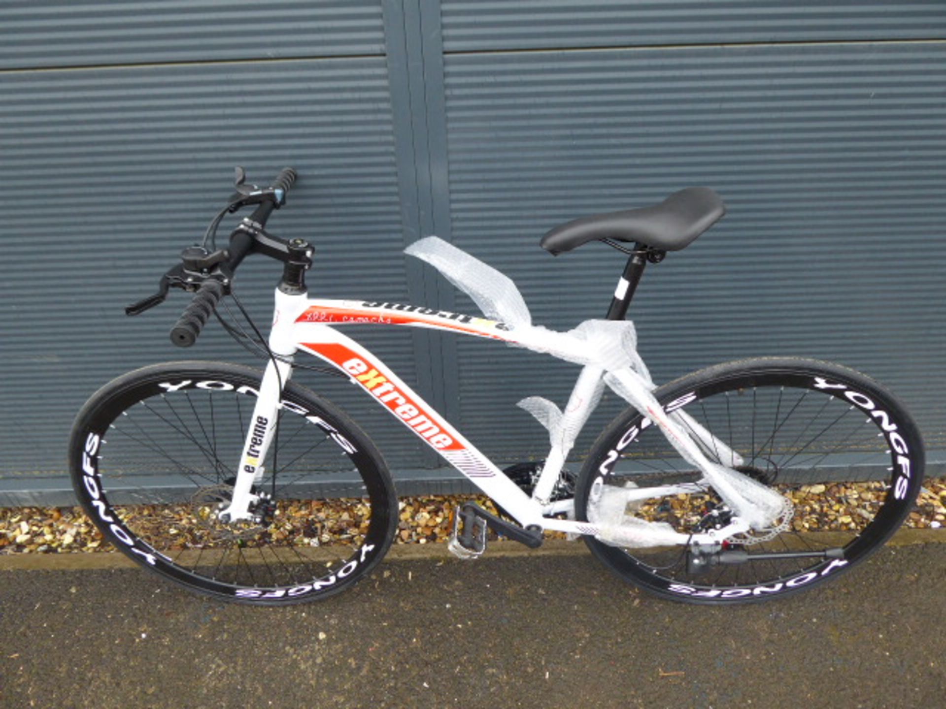 White and red Extreme Shimano geared road bike