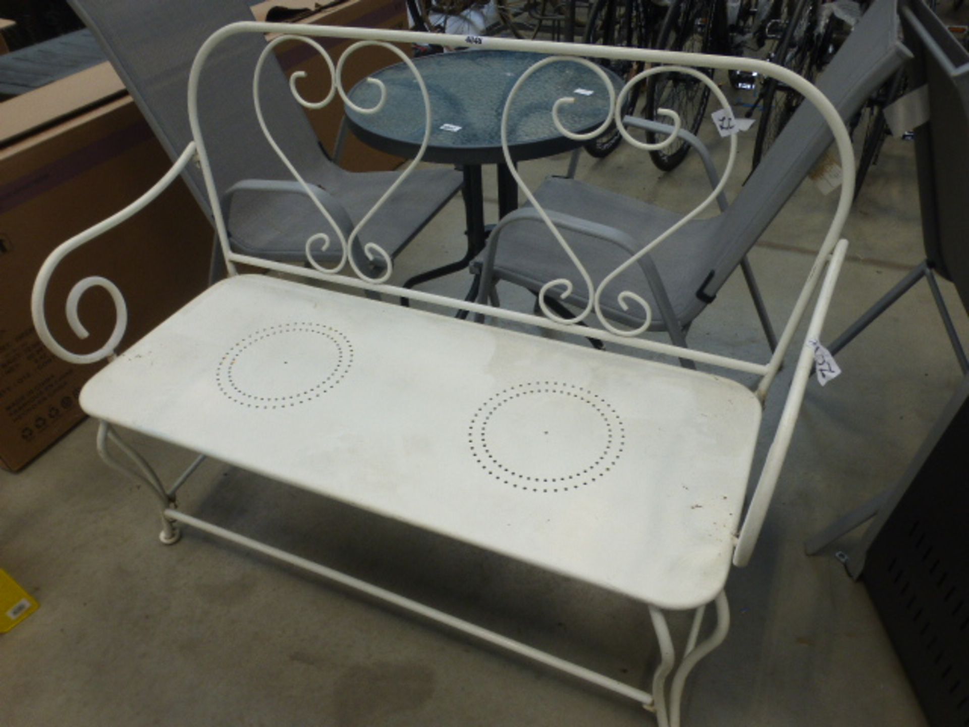 White metal garden bench