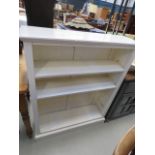 White painted open-fronted bookcase