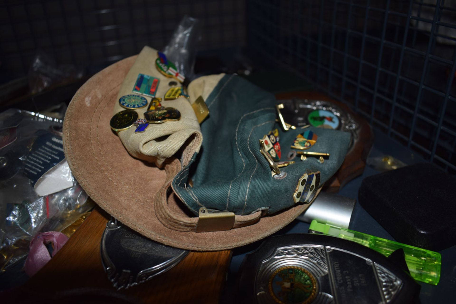 Cage containing wristwatches, loose coinage plus a quantity of badges and medallions - Image 3 of 4