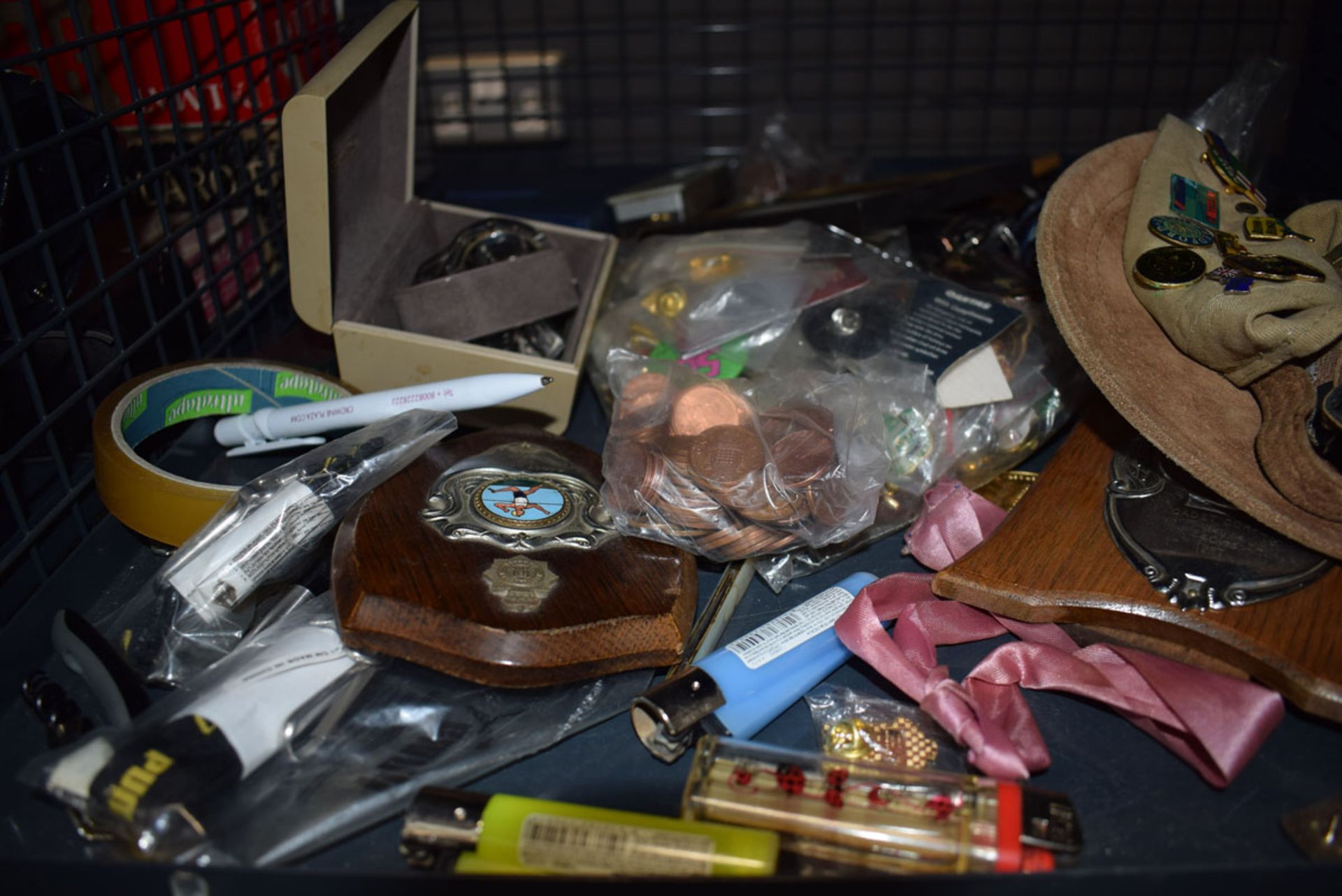 Cage containing wristwatches, loose coinage plus a quantity of badges and medallions - Image 4 of 4