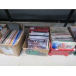 4 boxes containing vinyl records