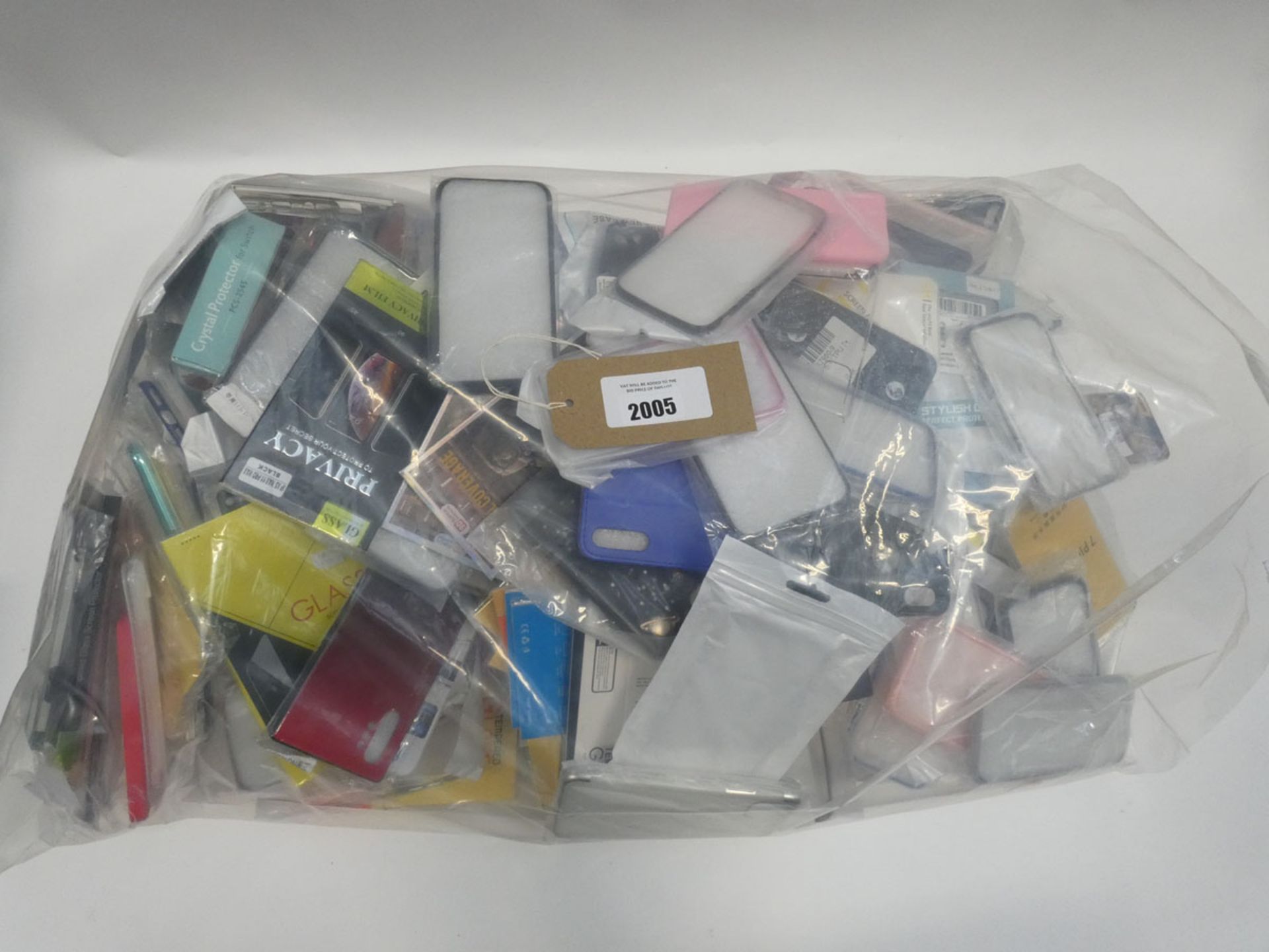 Bag containing quantity of mobile phone covers and cases