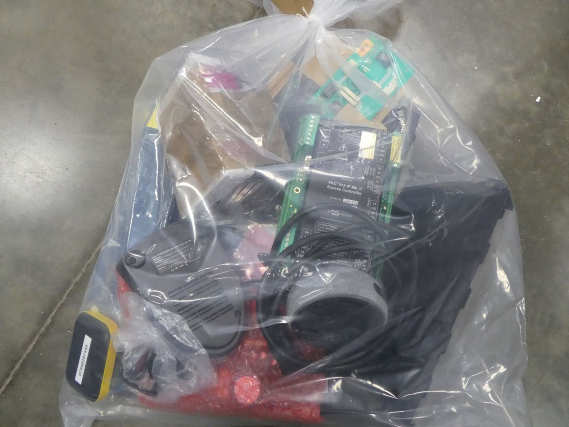 Bag containing quantity of various electrical related accessories; keyboards, screens, adapters, etc