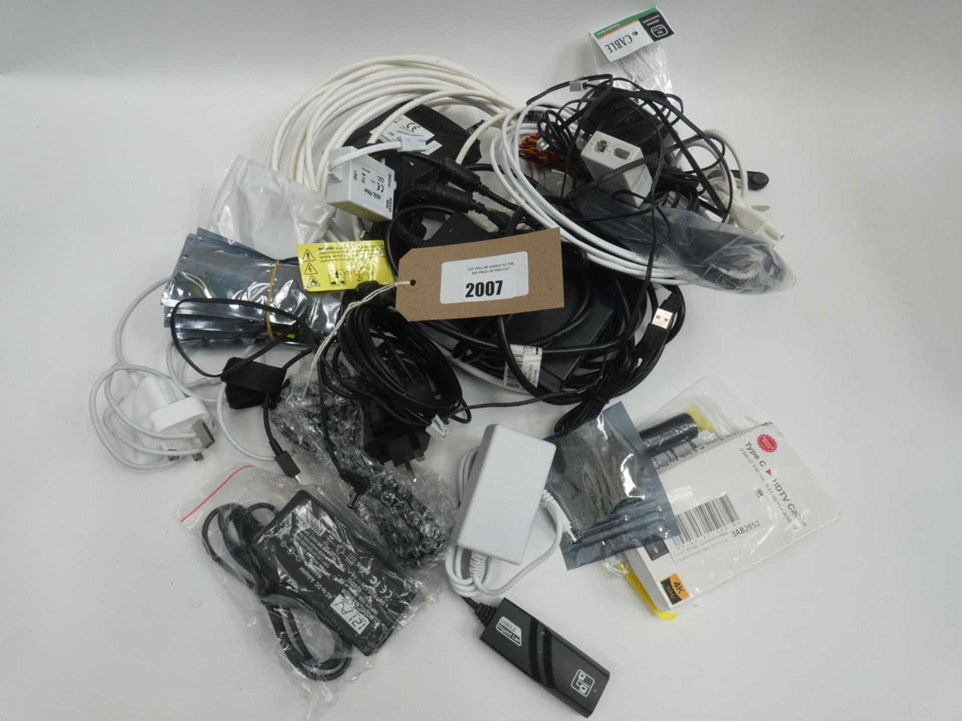 Bag containing quantity of cables, leads and PSUs