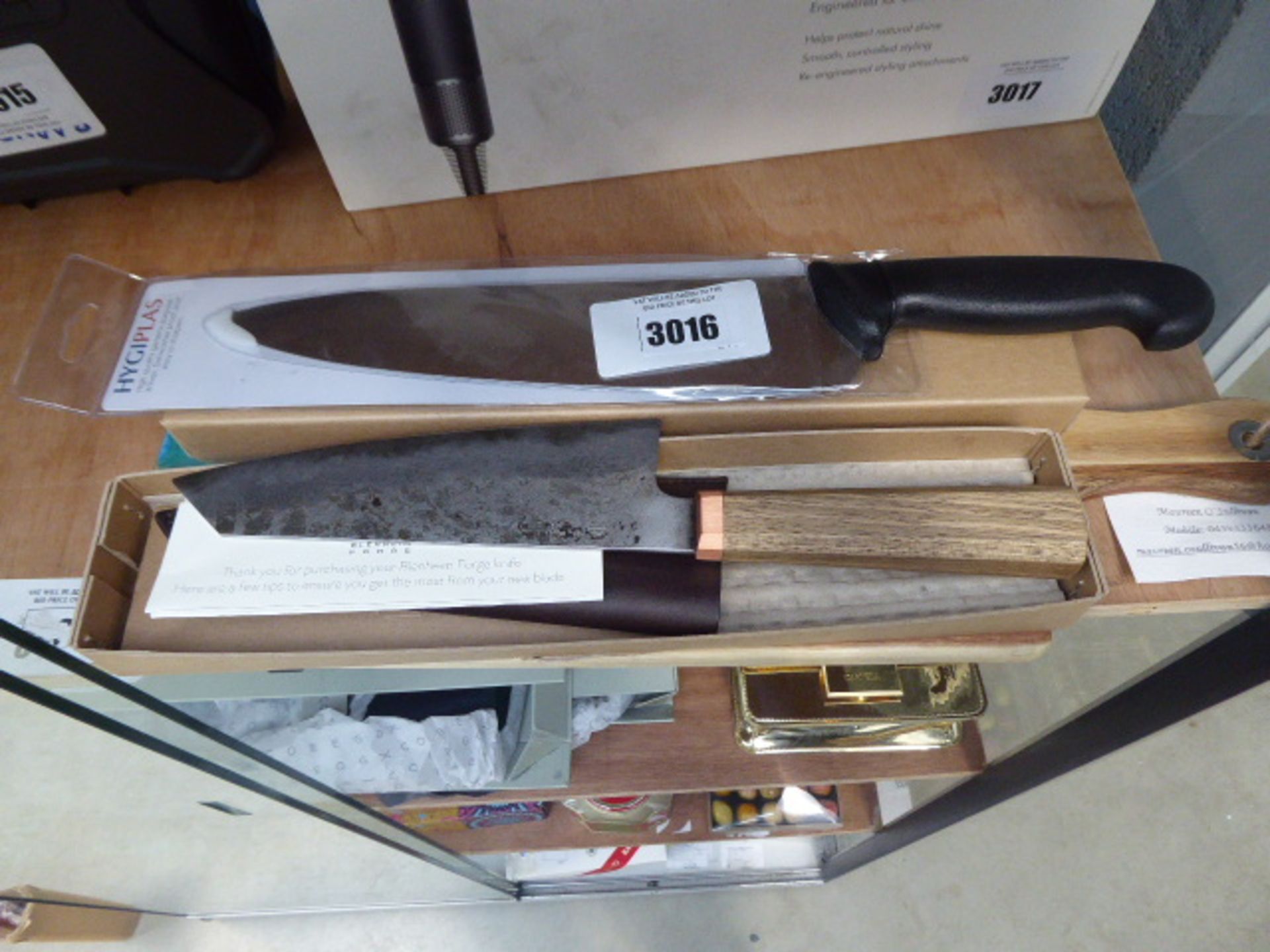 1 kitchen knife plus a Blenheim Forge knife