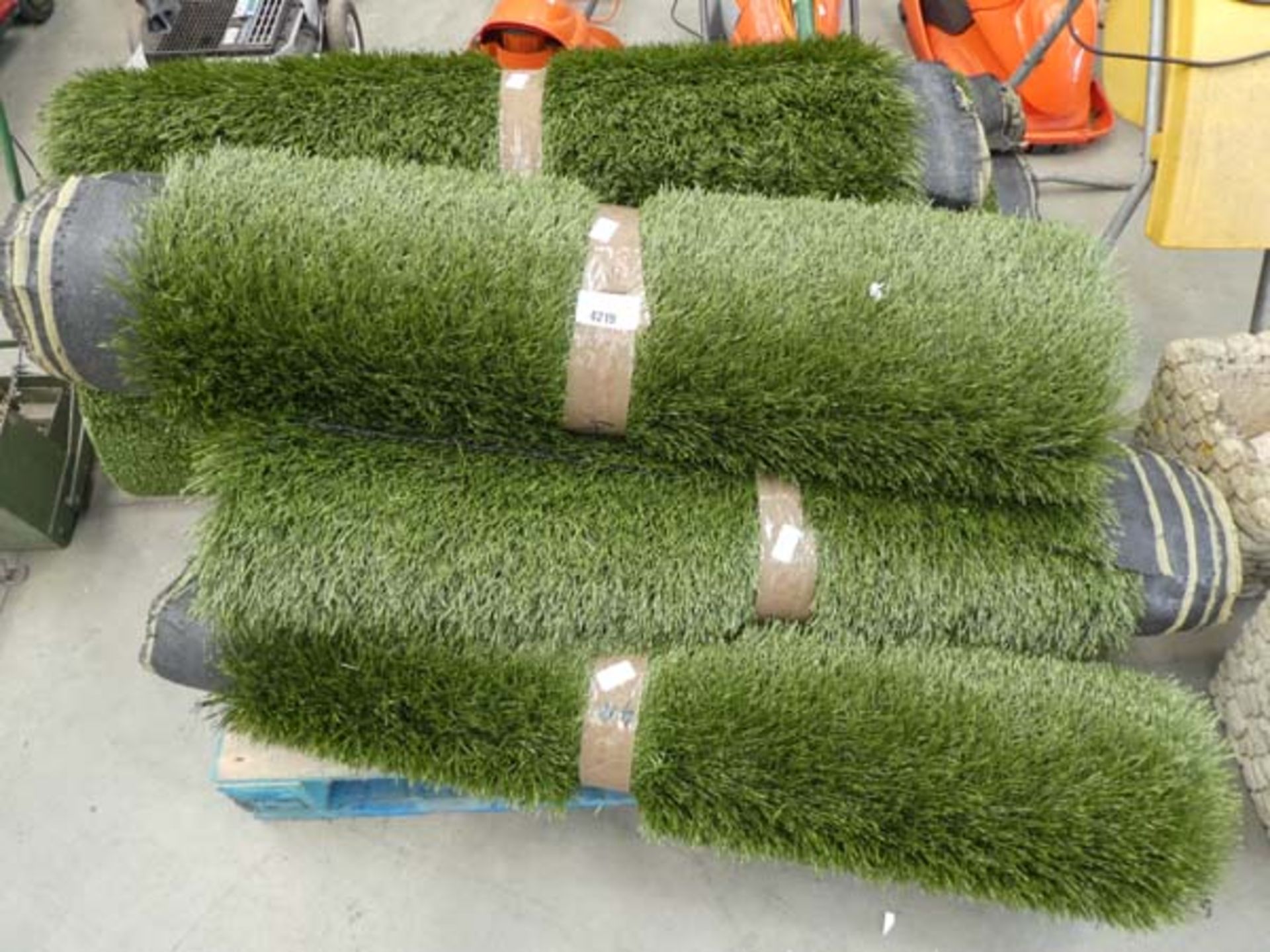 Seven small rolls of assorted astro turf