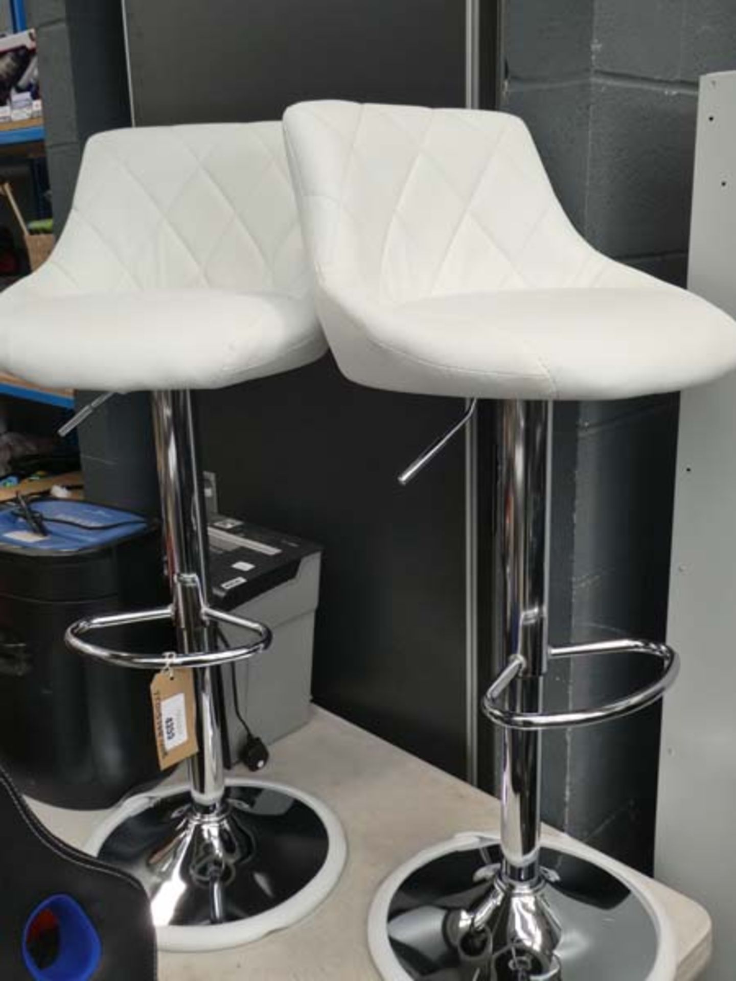 2 white chrome framed bar stools