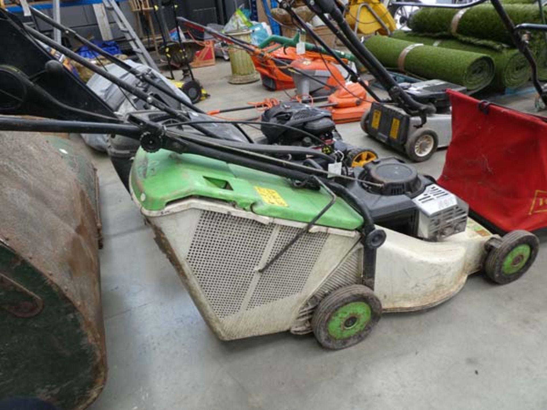 Etesia petrol powered mower with grass box Heavily used, some damage to handle. Model F-67160
