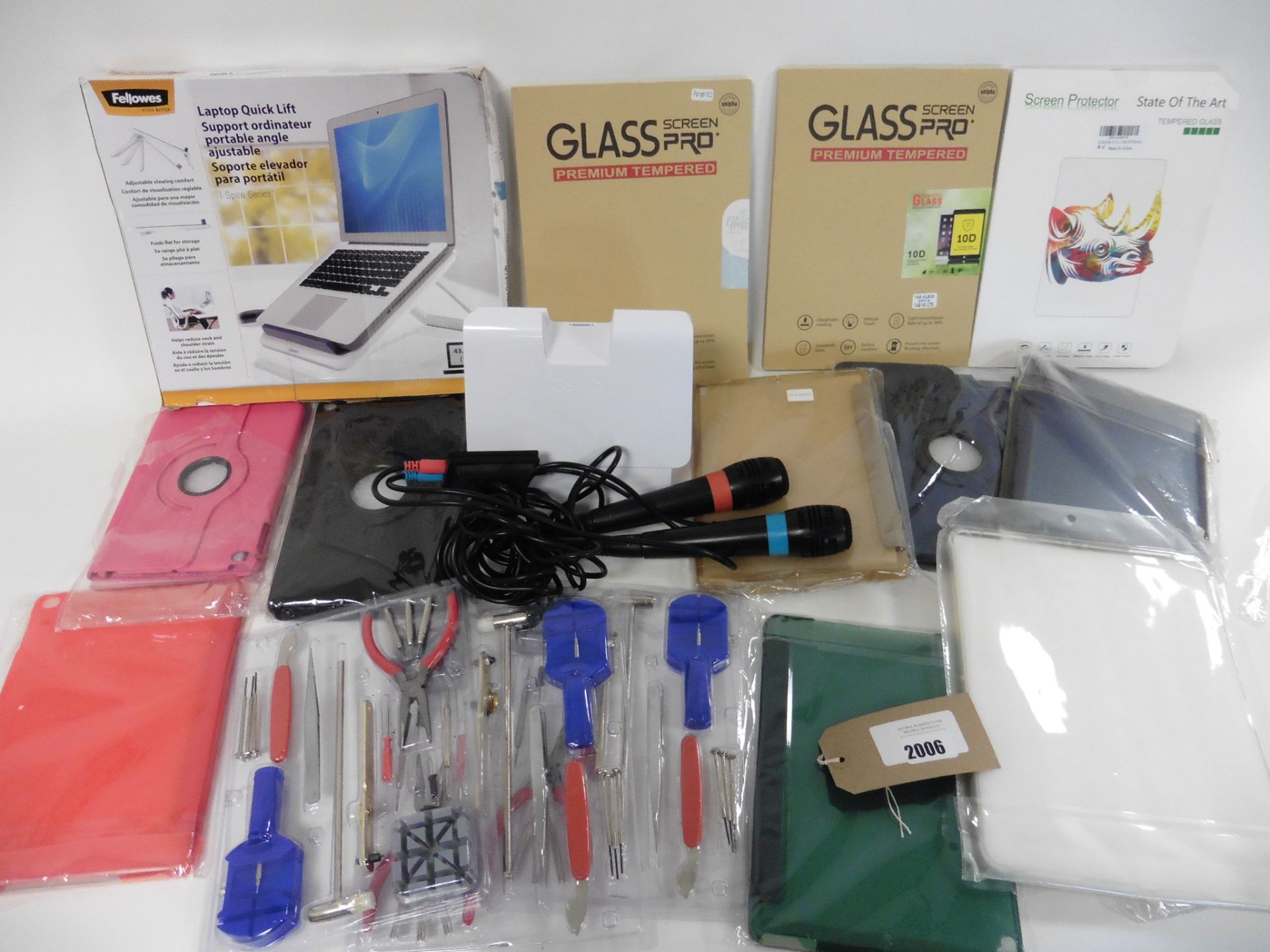 bag of Tablet cases & covers, laptop stand, tablet stand, pair Singstar microphones and 3 small tool