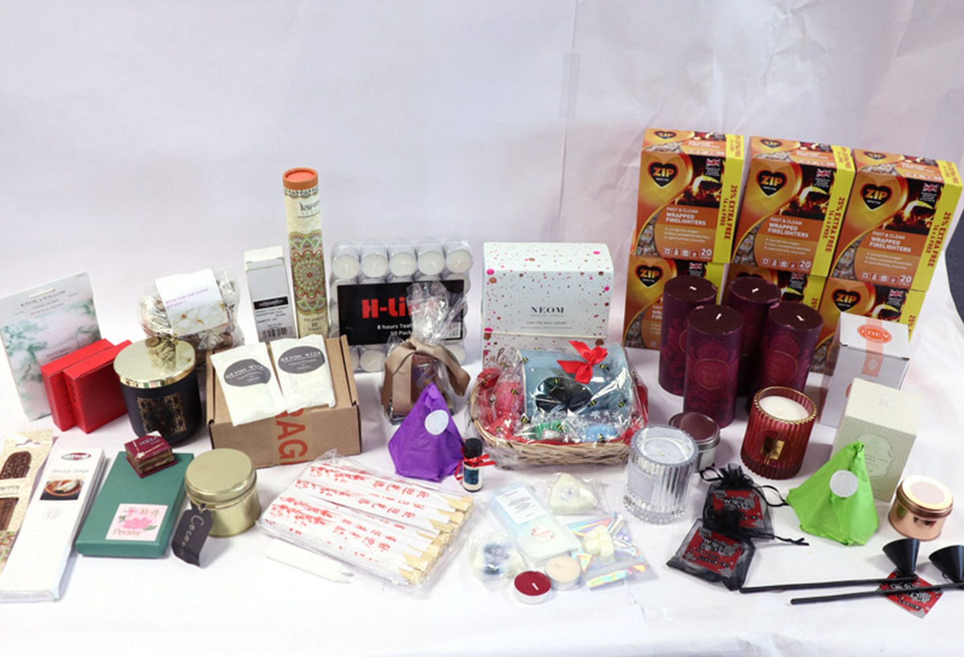 Assortment of candles, incense, firelighters and scents