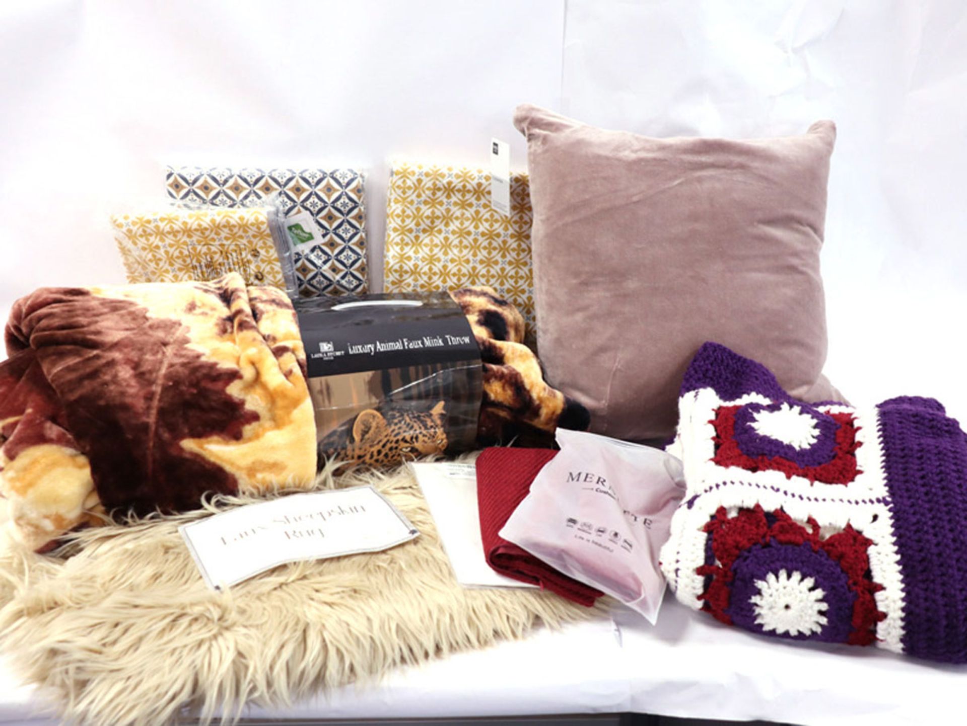 2x faux sheepskin rugs, luxury leopard print faux mink throw, purple patterened woolen throw, 3x