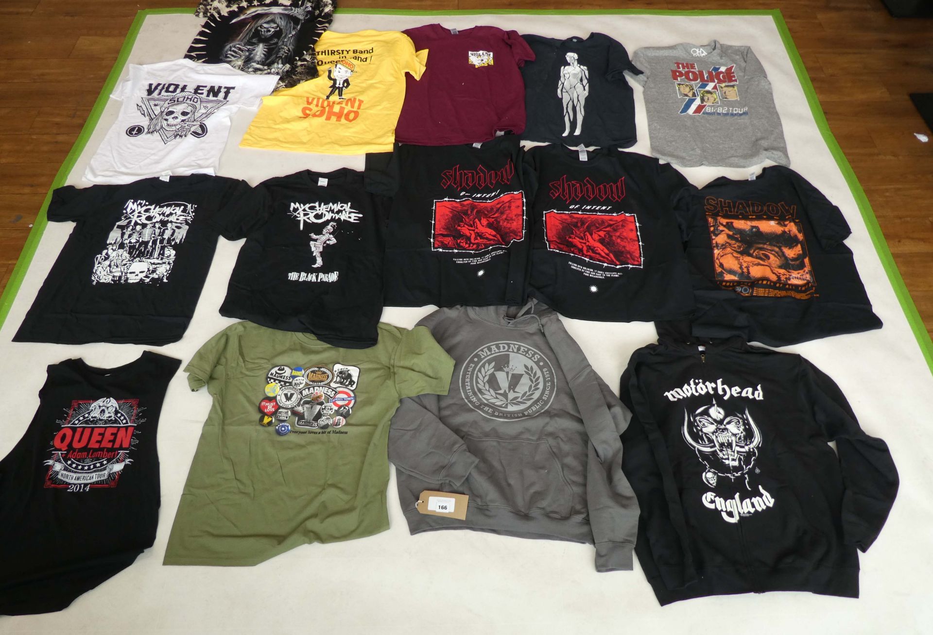 Selection of rock / music clothing to include Queen, Madness, Motorhead, etc
