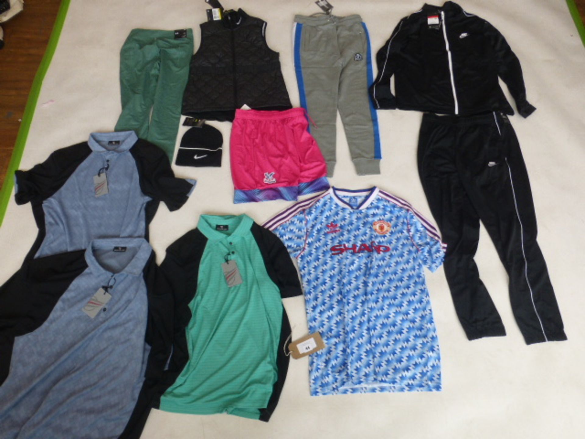 Selection of sportswear to include Nike, Brick Fielder, Adidas, etc