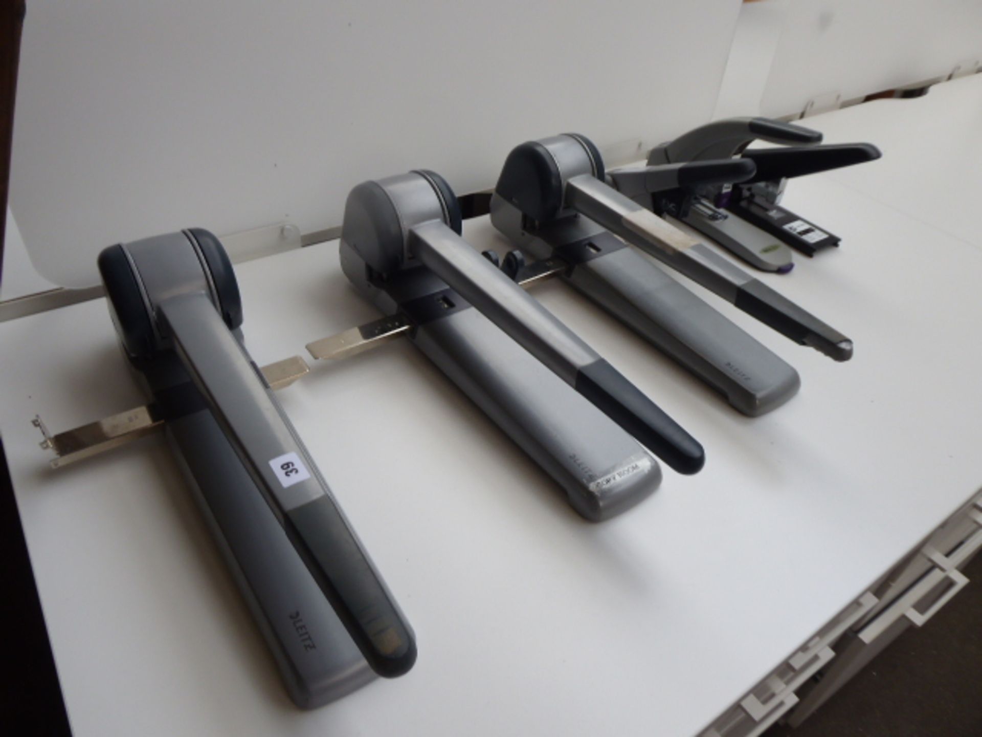 3 Leitz large hole punches with 3 large staplers