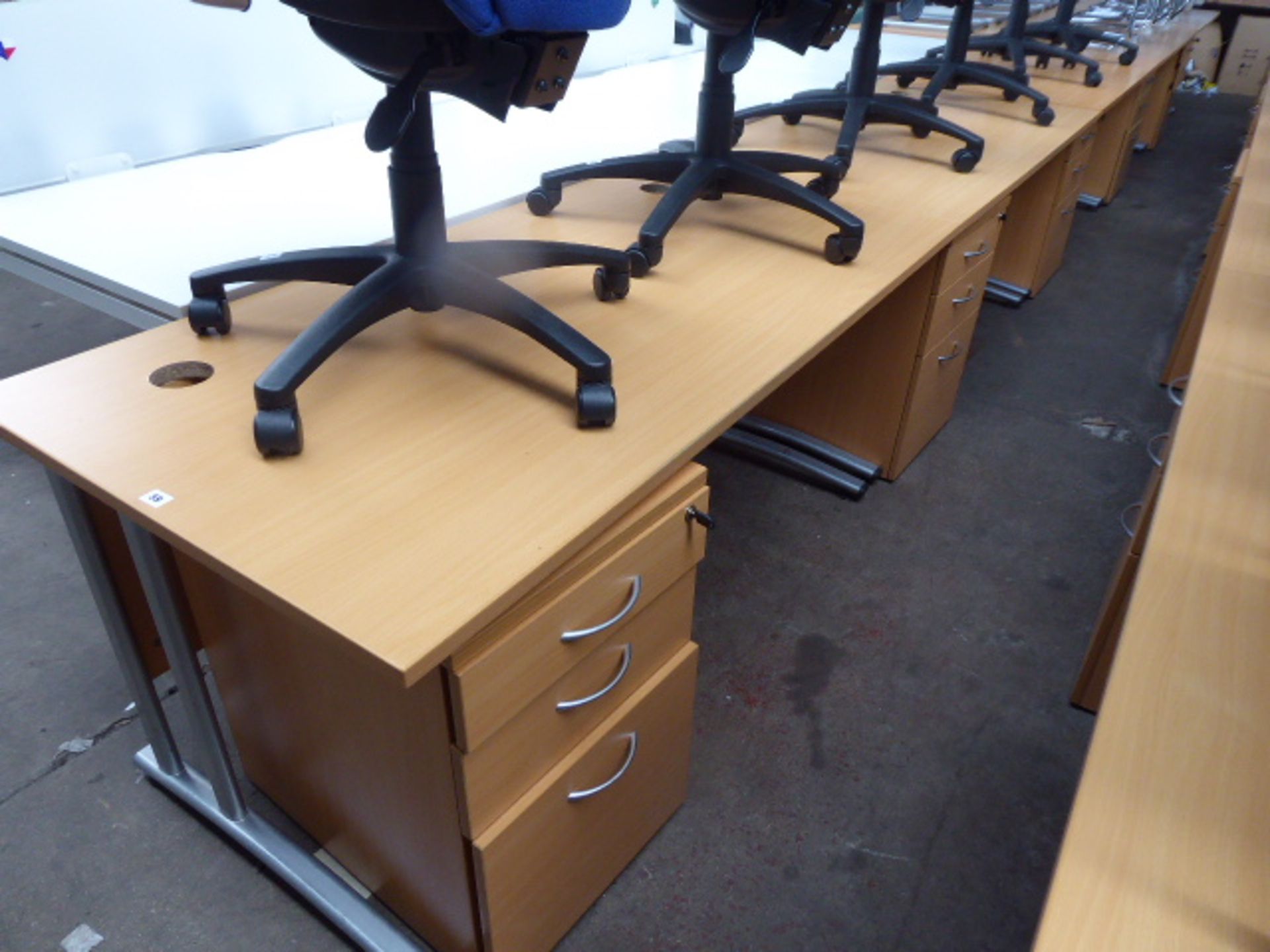 Five 160cm light oak straight front work stations on cantilever legs, each with matching three