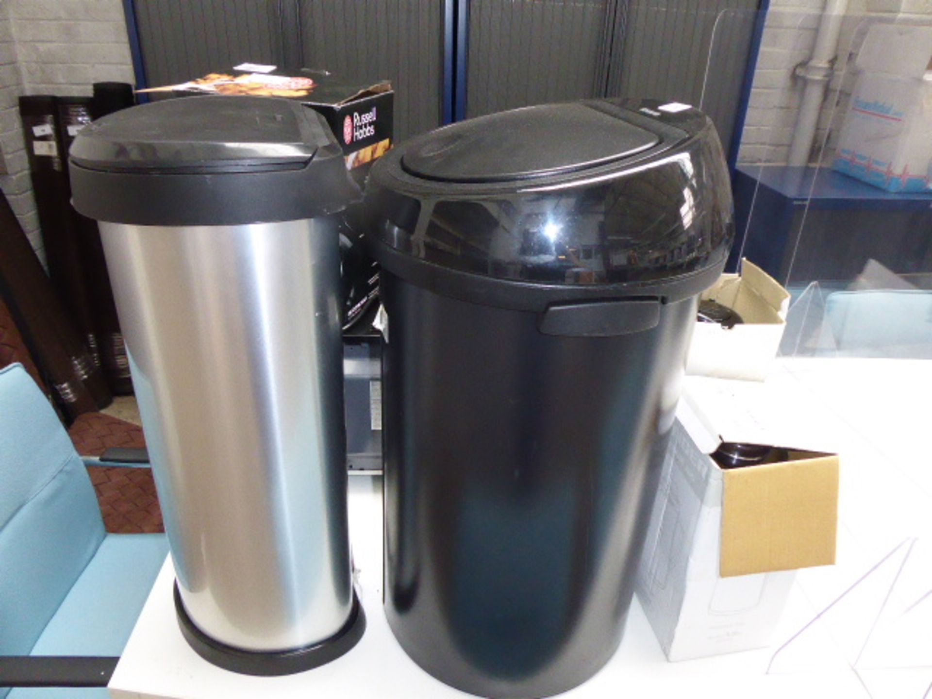 2 bins, microwave, coffee machine, kettle and 2 flasks