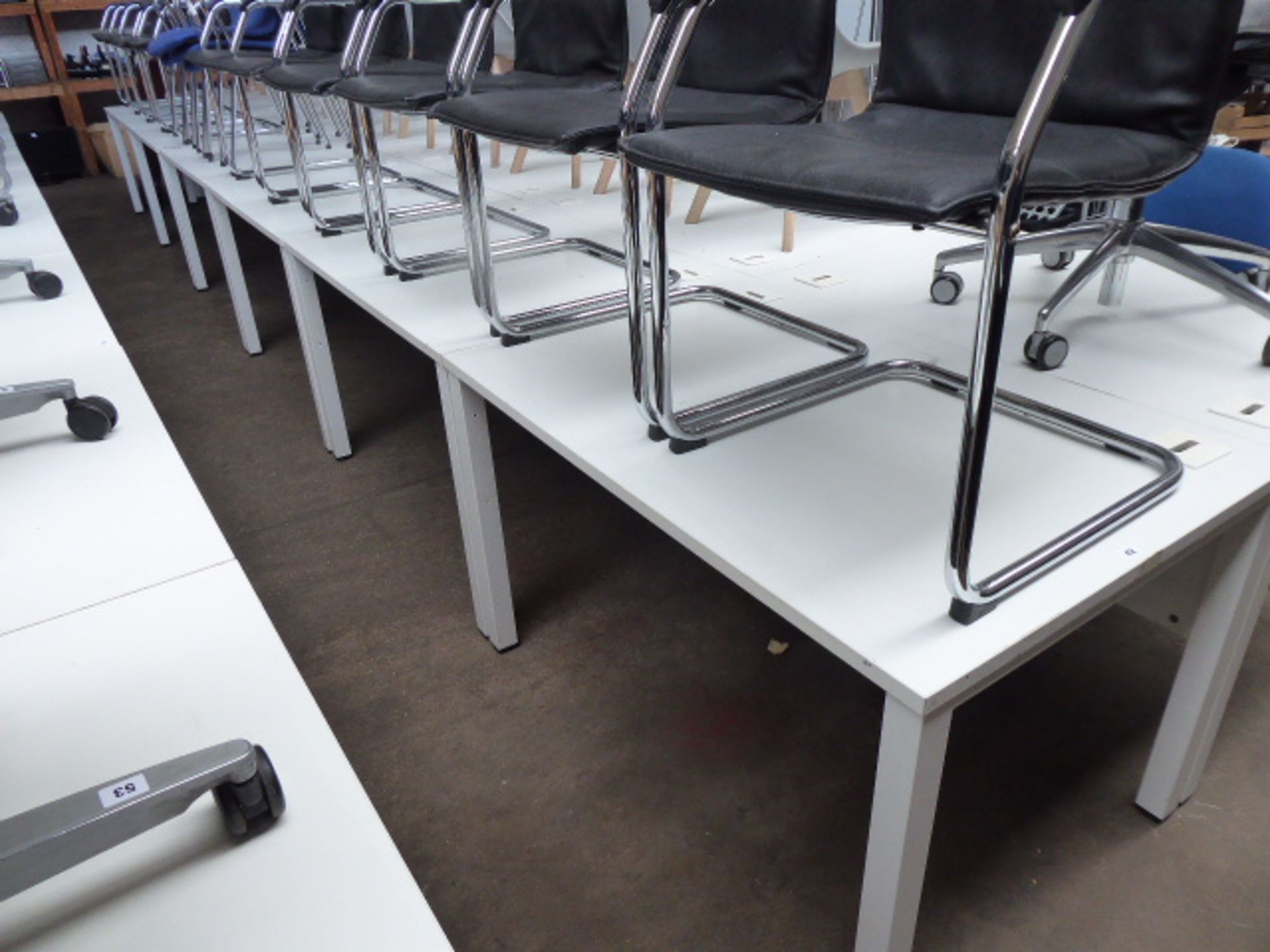 Six 120cm white work stations on straight legs