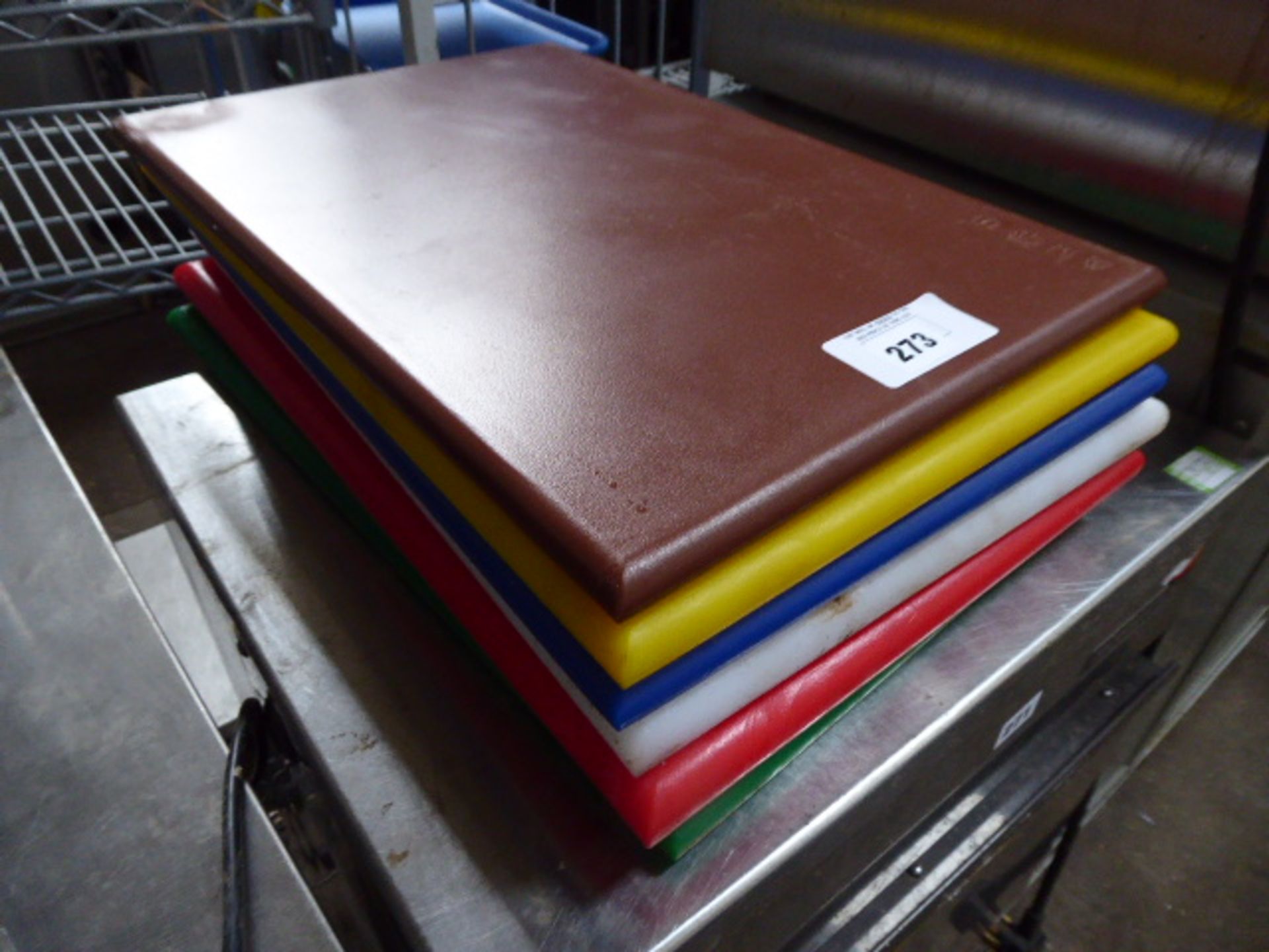 Stack of 5 colour coded chopping boards