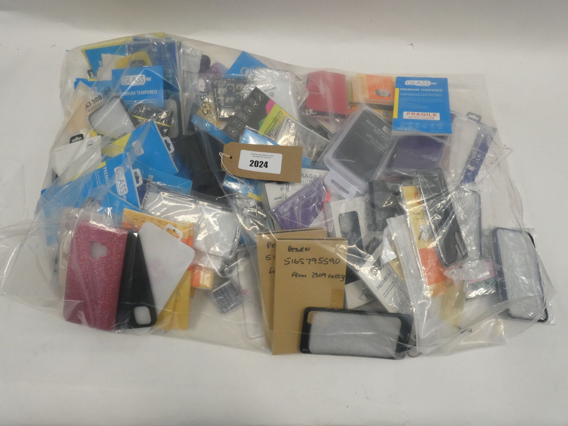 Bag containing quantity of mobile phone cases and covers