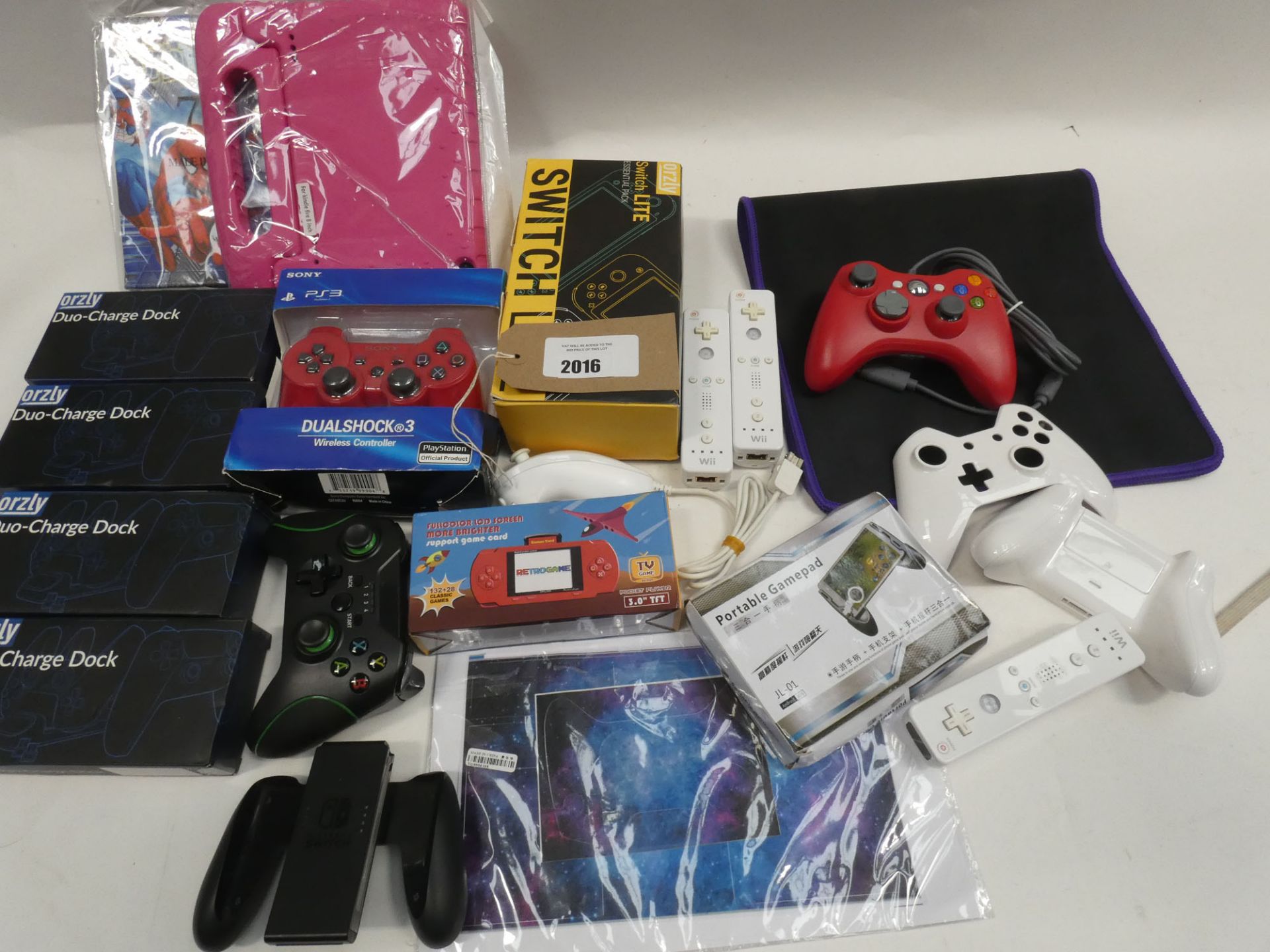 Bag containing quantity of gaming accessories; controllers, handheld game consoles, charging