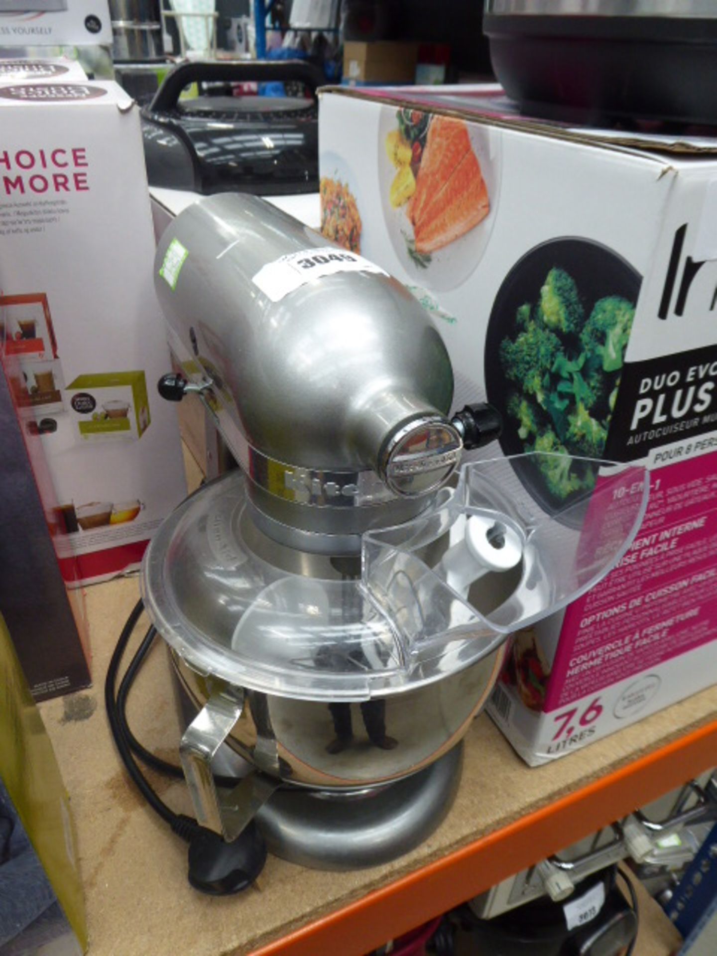 (TN18) - Unboxed Kitchen Aid standing mixer with bowl and three attachments Item is used, has cake