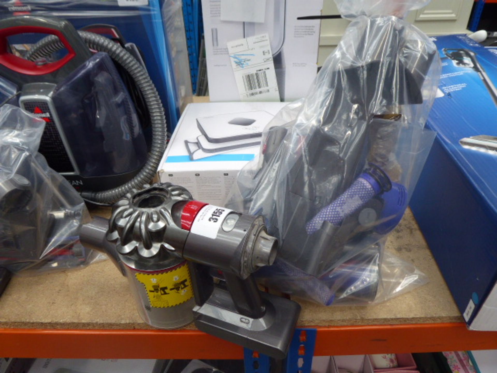 Hand held Dyson V8 Absolute, with accessories, to include: pole, some attachments, head, charger etc