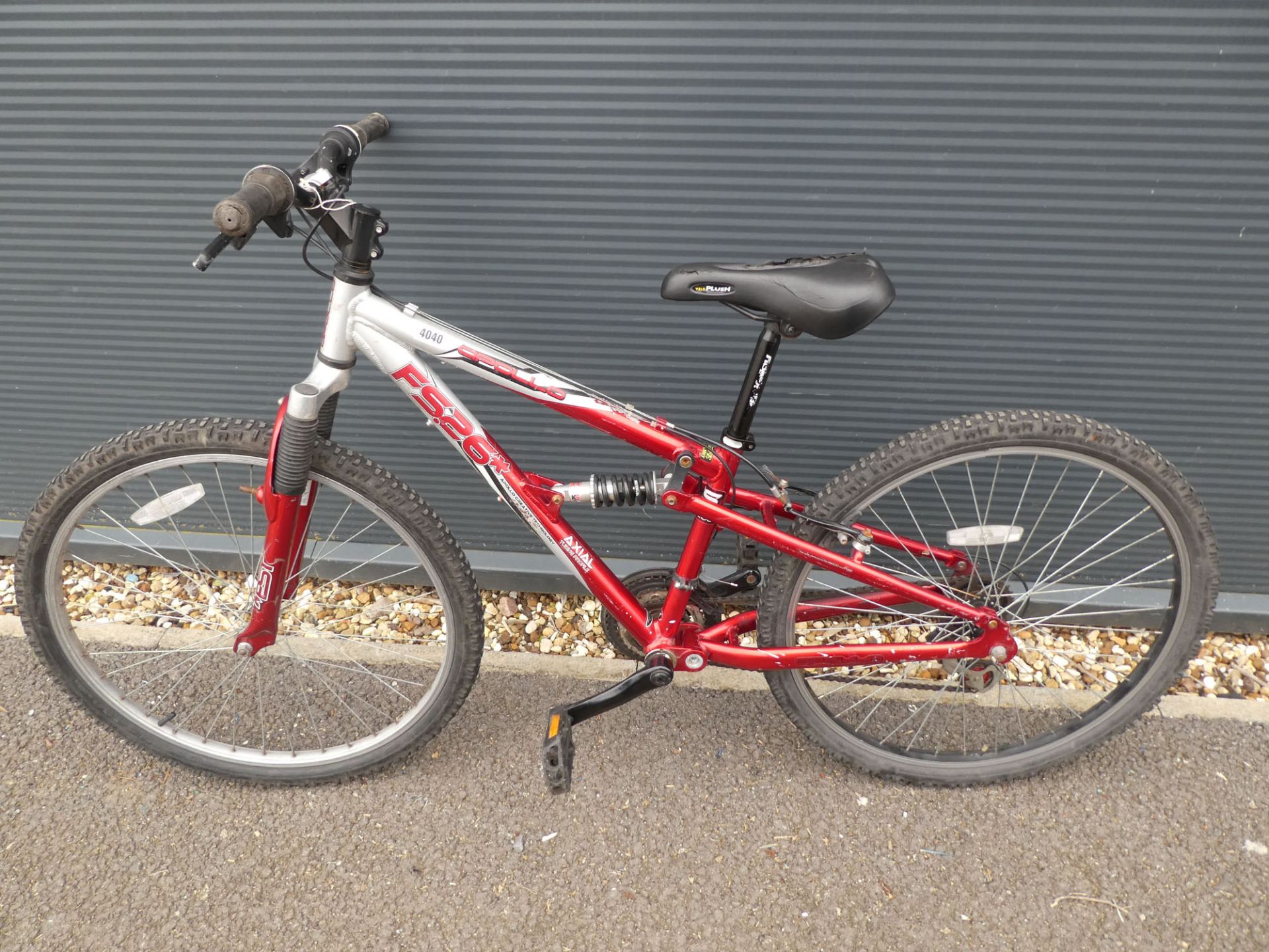 Red and silver Apollo gents mountain bike