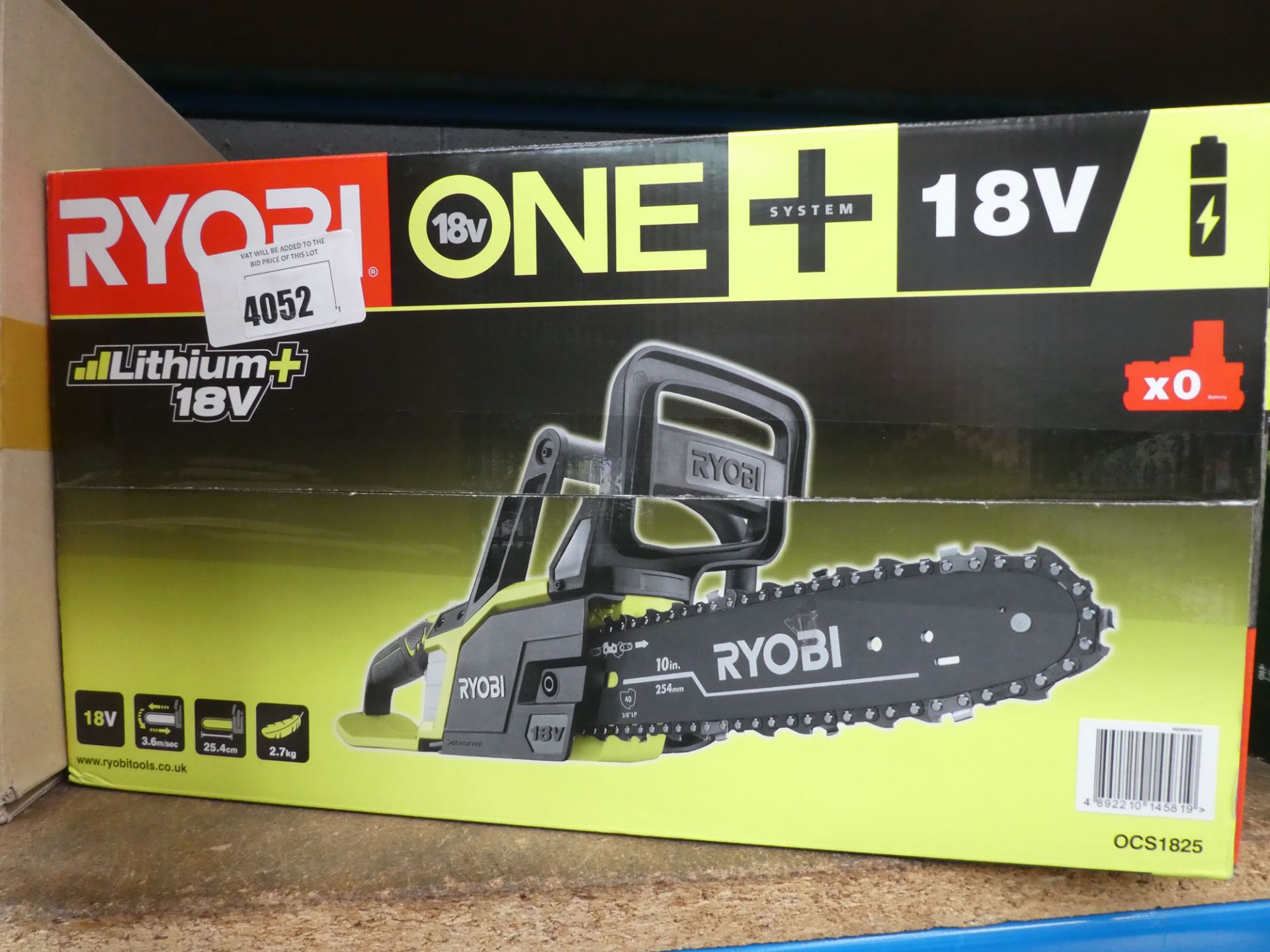 Boxed Ryobi battery powered chainsaw