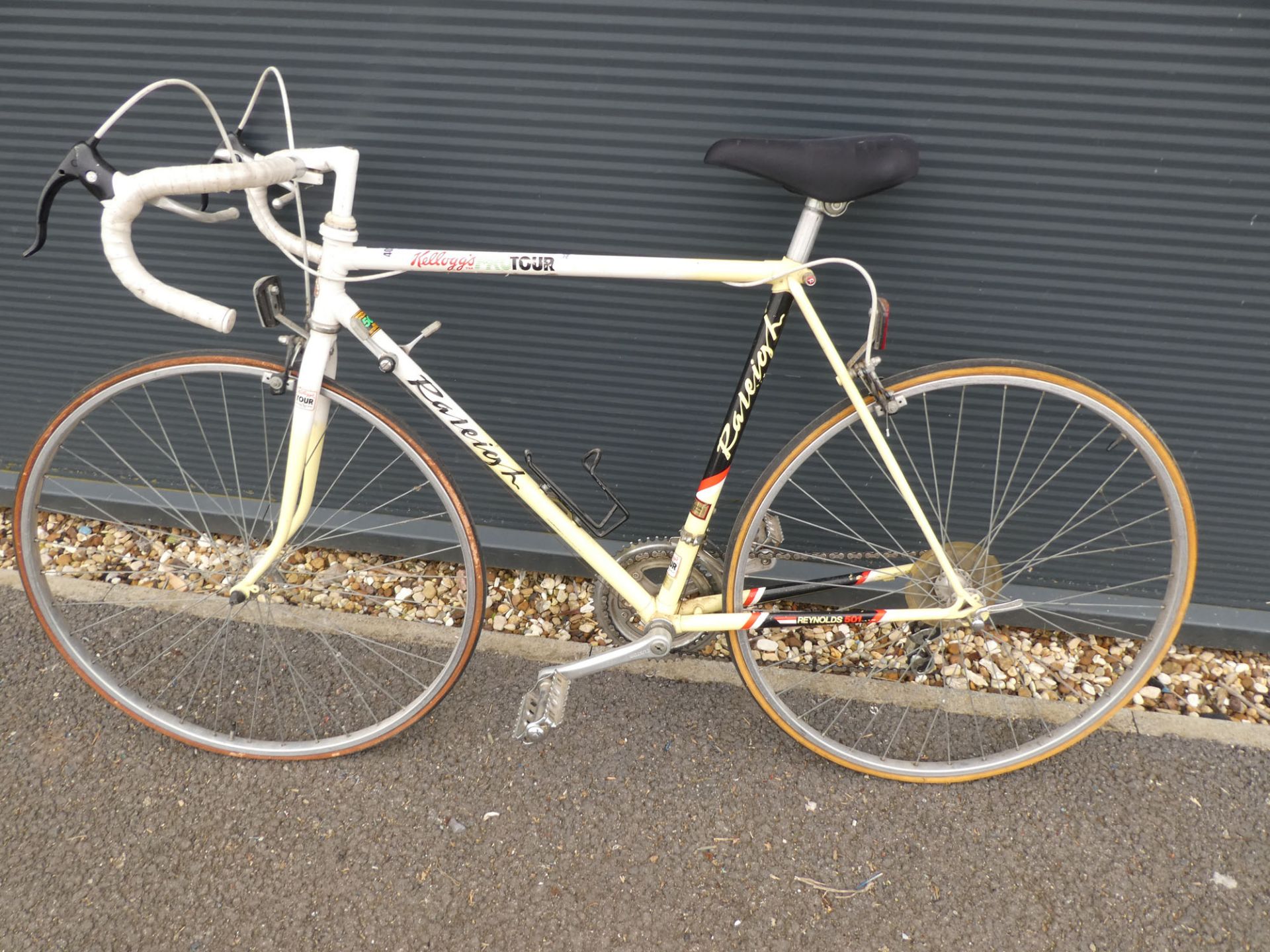 Raleigh yellow and white racing bike