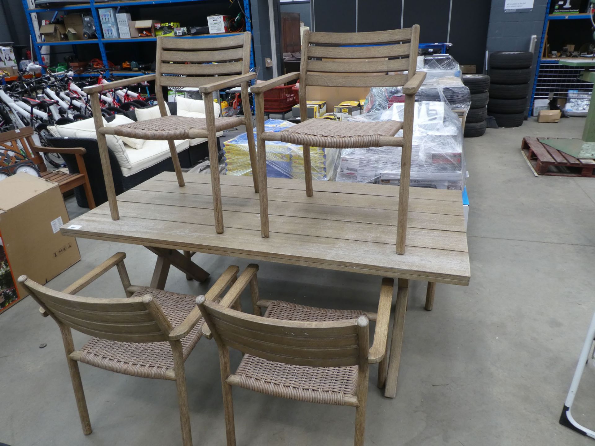 Large rectangular wooden garden table with 4 chairs and a rattan top bench seat Slight chips on