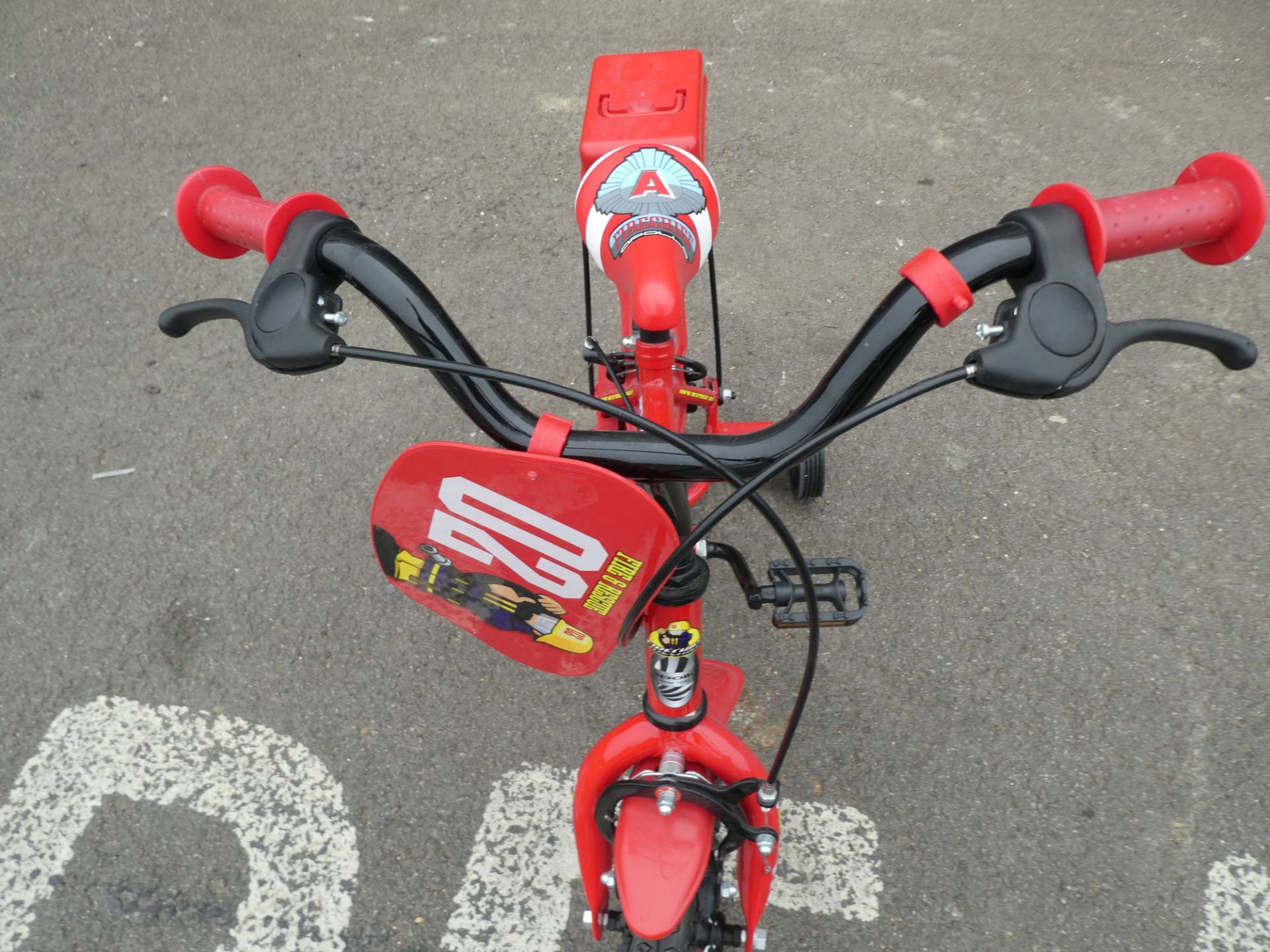 Red small Fireman Sam childs bike with stabilisers - Image 2 of 2