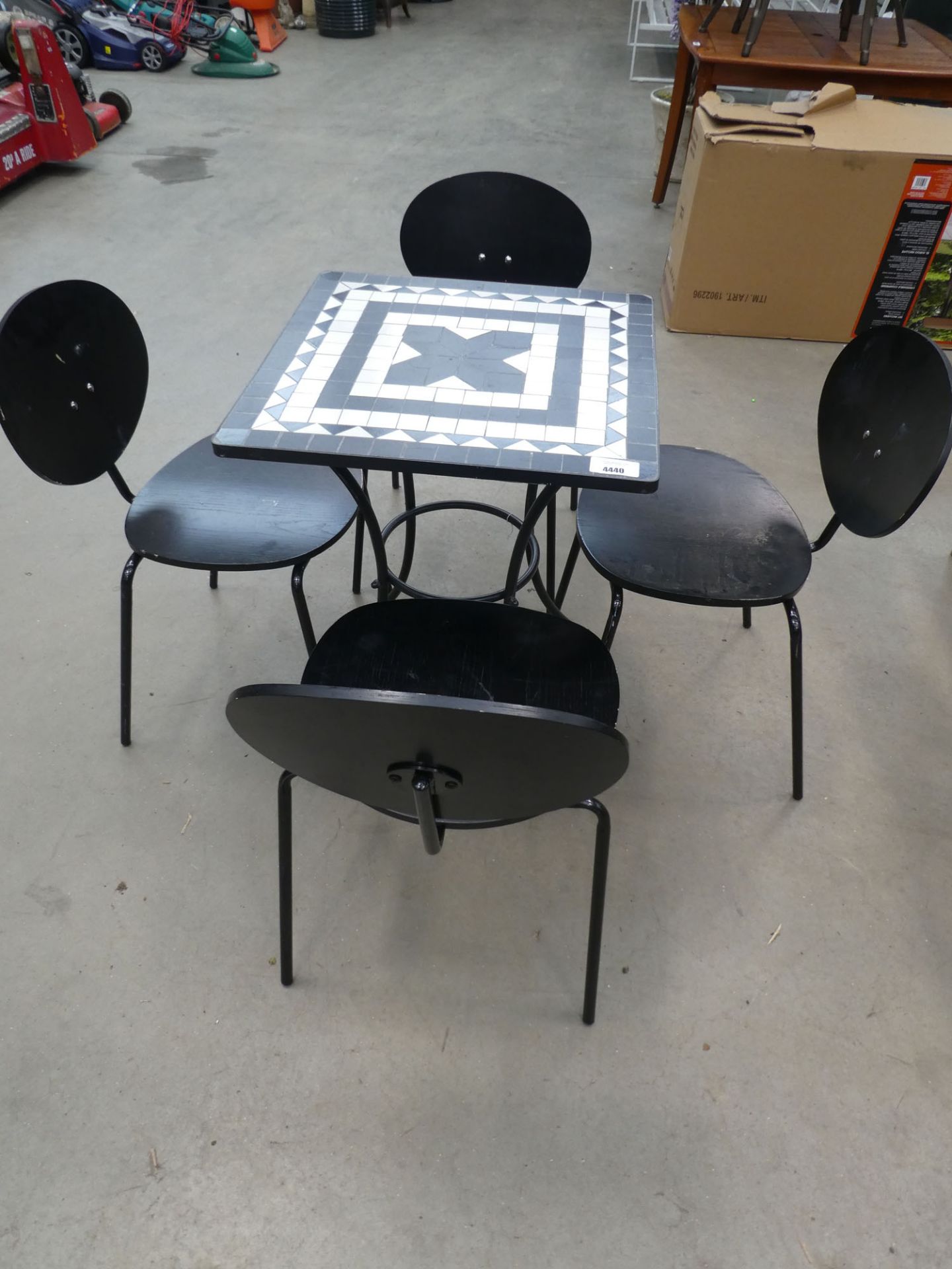 Small square tile topped table and 4 wooden matching chairs