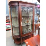 Bow fronted Edwardian china cabinet Height: 168cm Depth: 39cm Width: 117cm. Few chips, dents,