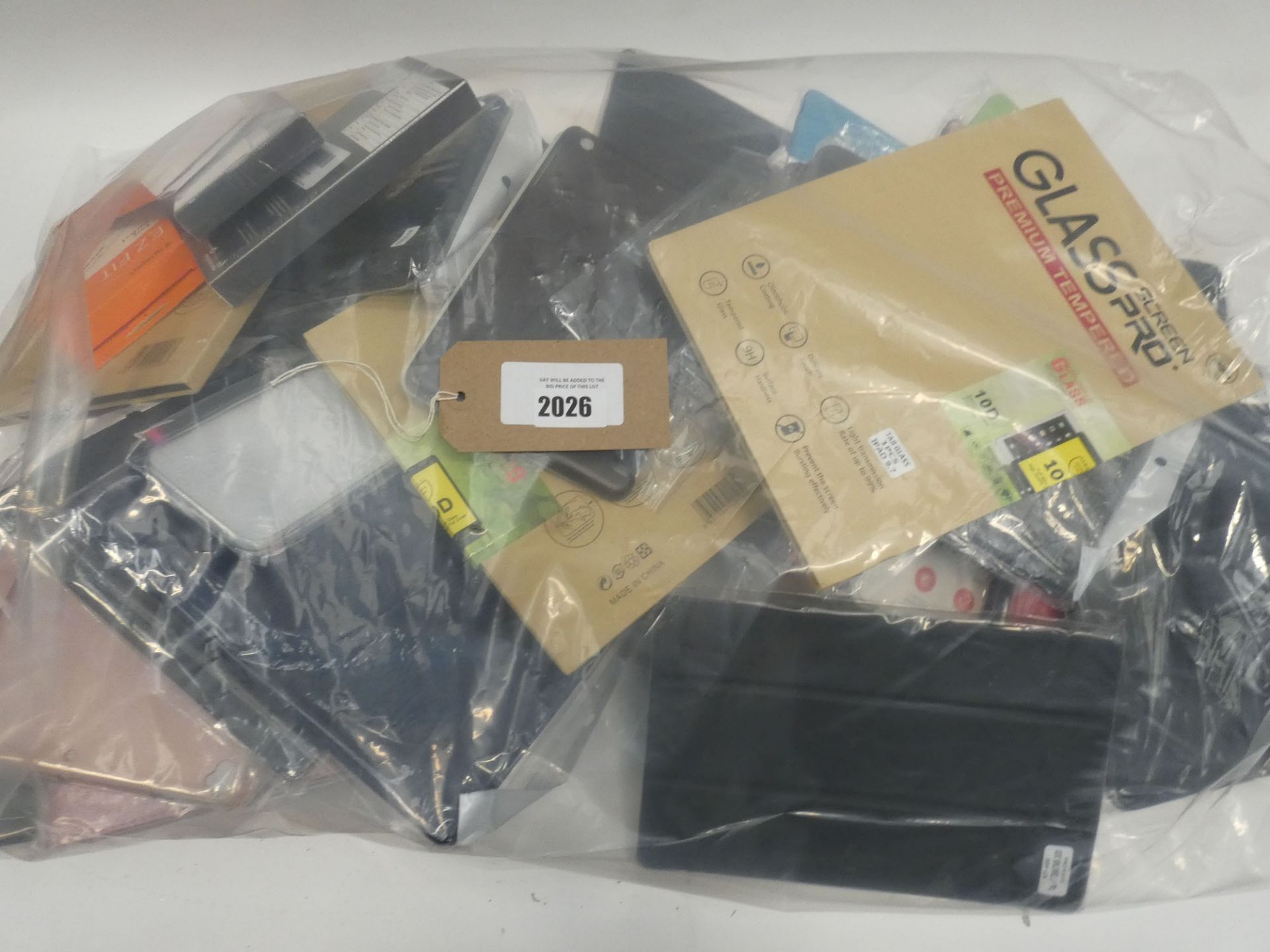 Bag containing quantity of mobile phone/tablet cases and covers