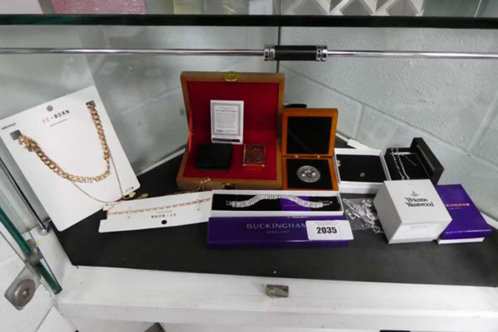 Selection of costume jewellery items, Zippo lighter and other jewellery items to include