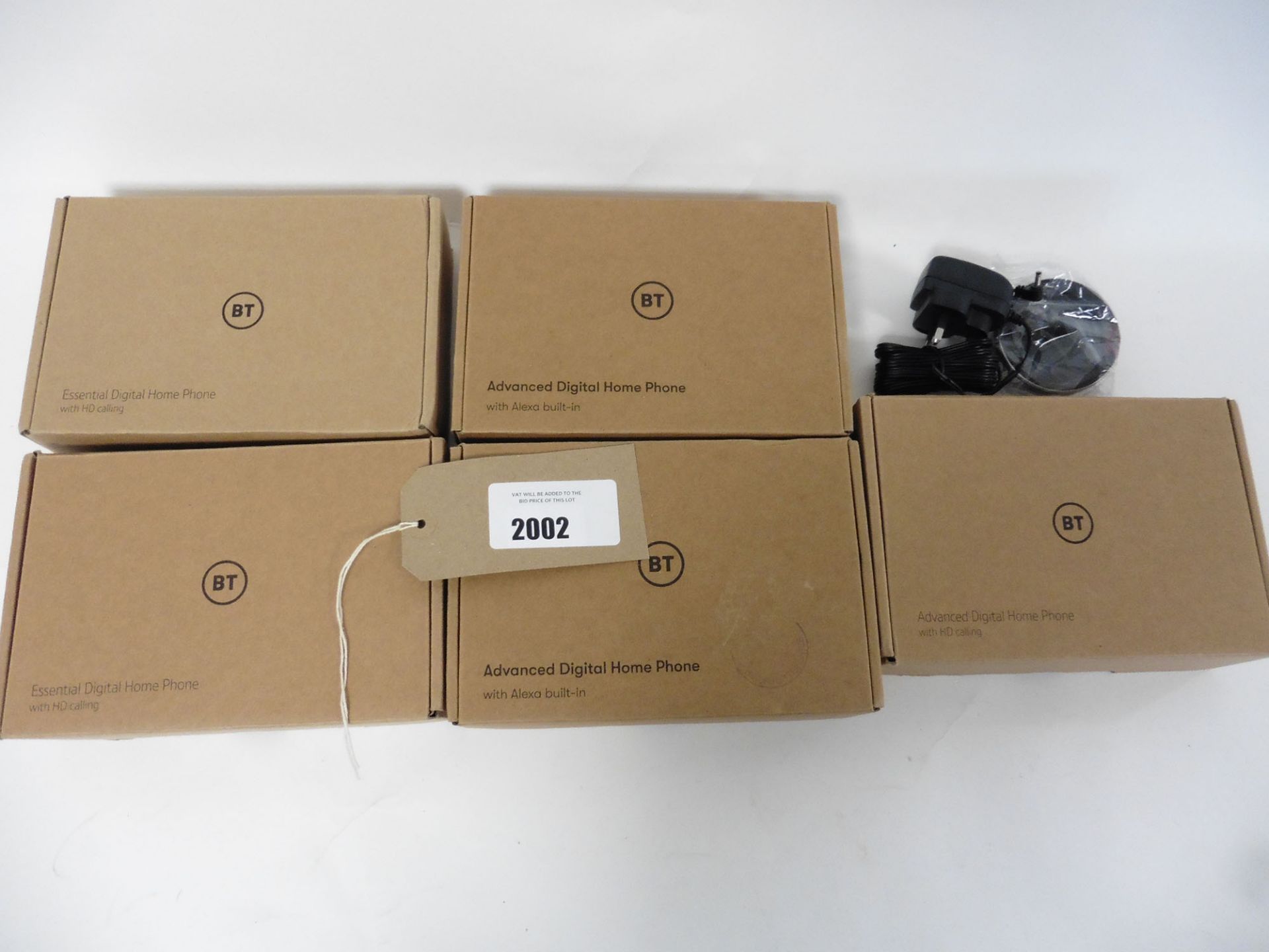 bag of 5 boxed Home phones, 1x Advanced Digital, 2x Advanced Digital with Alexa built-in & 2x