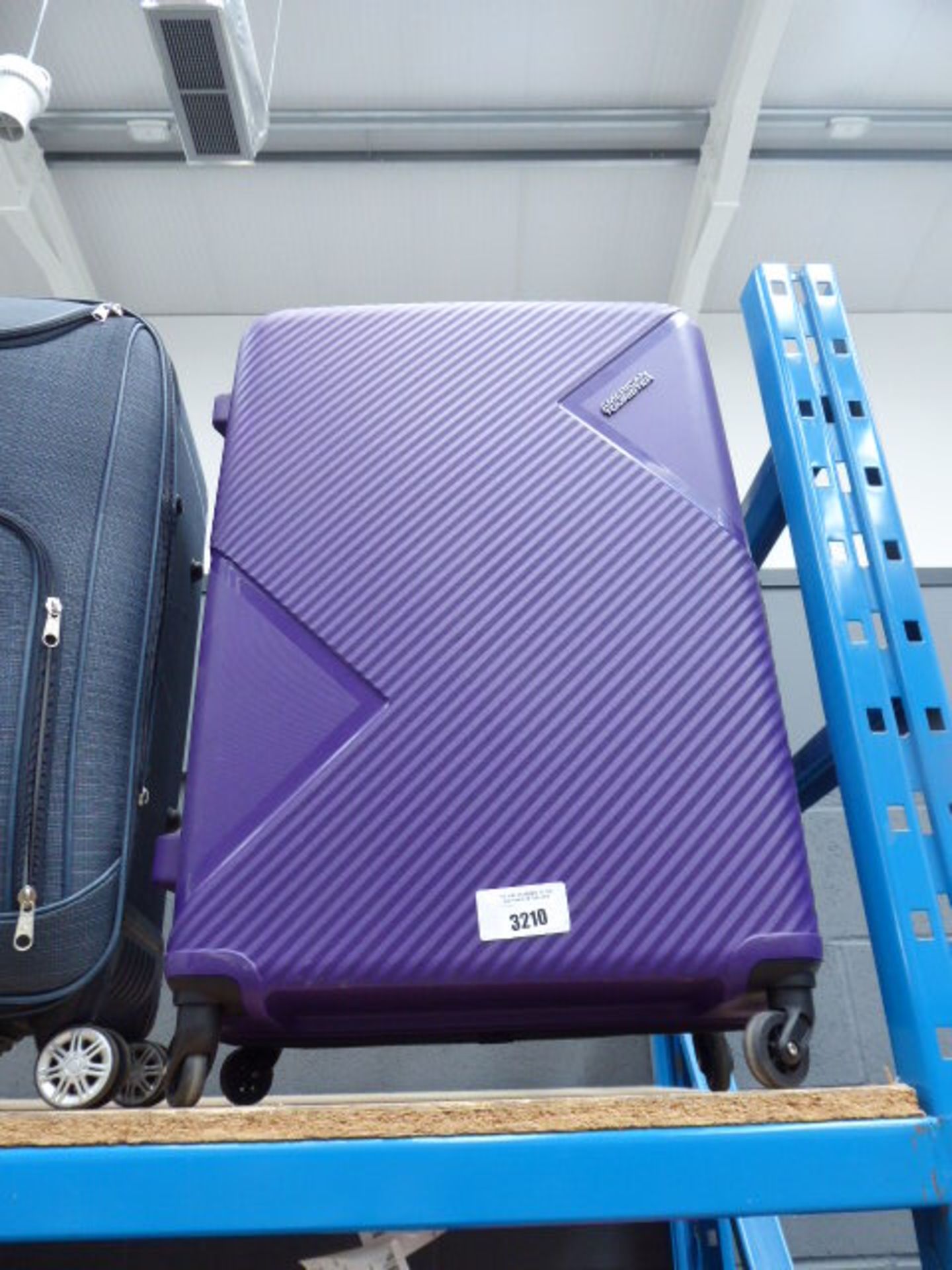 Large hard shell purple American Tourister suitcase