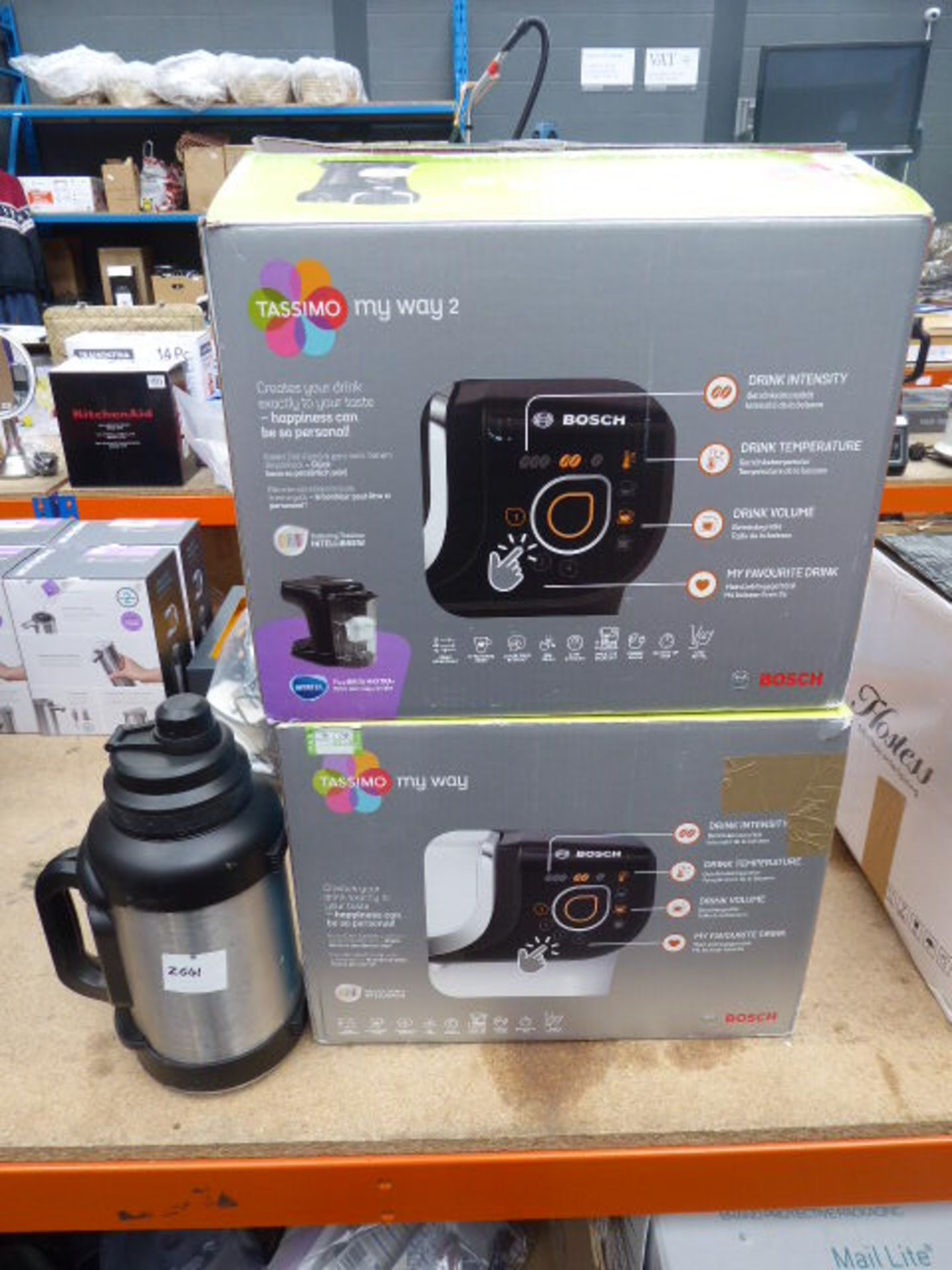 (TN16) 2 boxed Bosch Tassimo coffee machines plus a flask