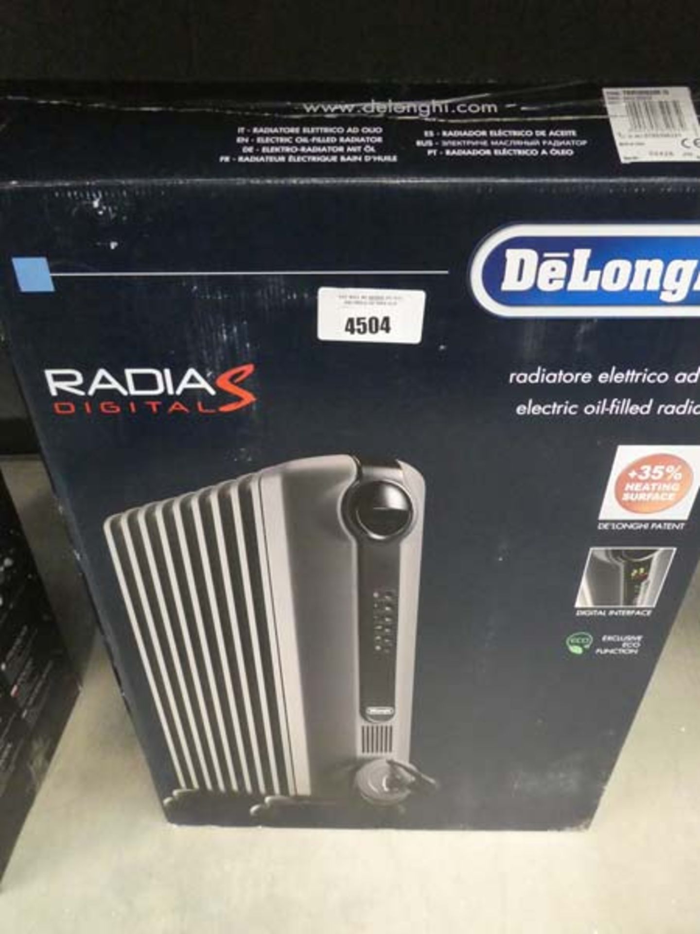 1x boxed, 1x unboxed grey DeLonghi oil filled radiators