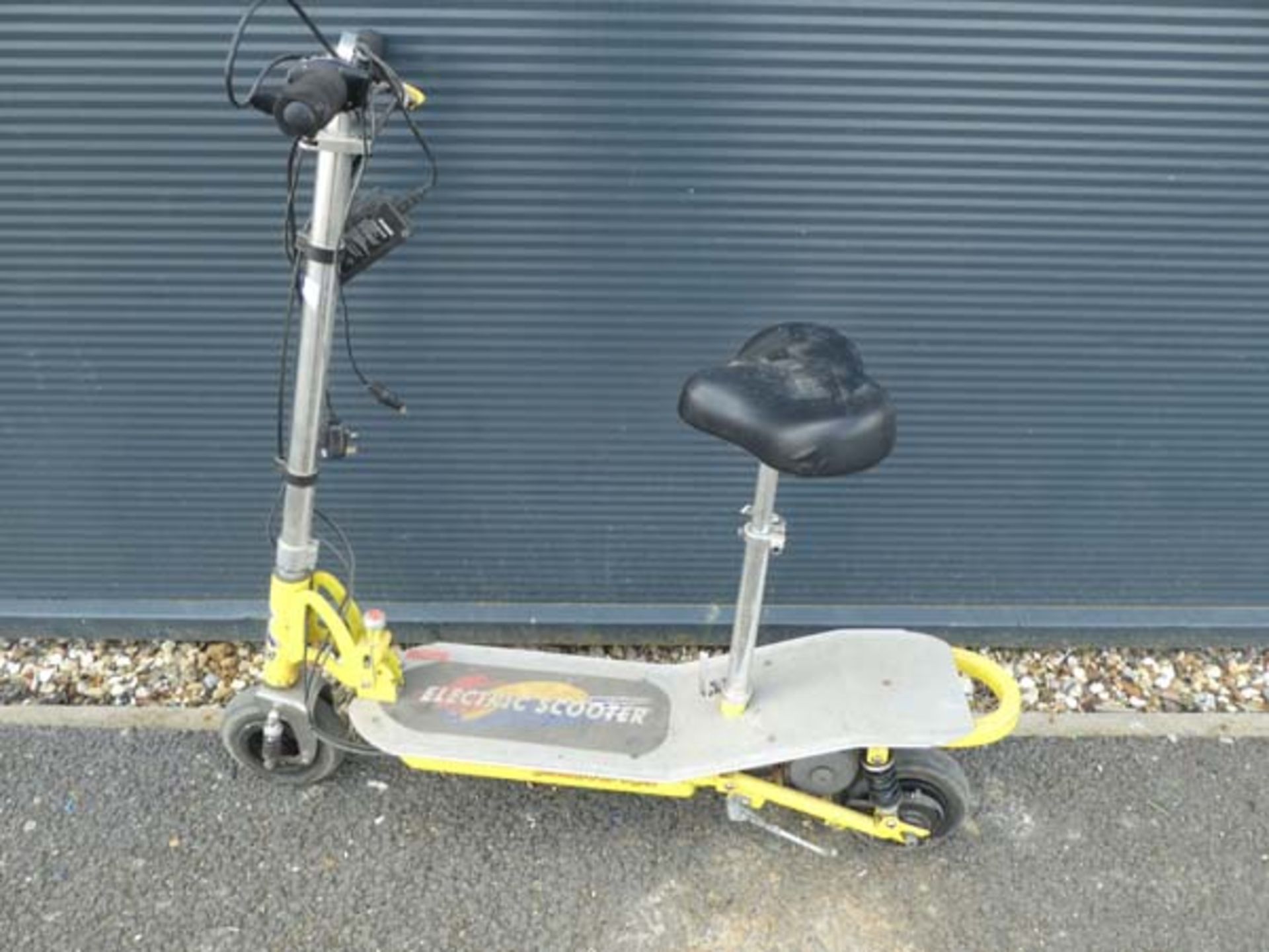 Yellow and silver electric scooter