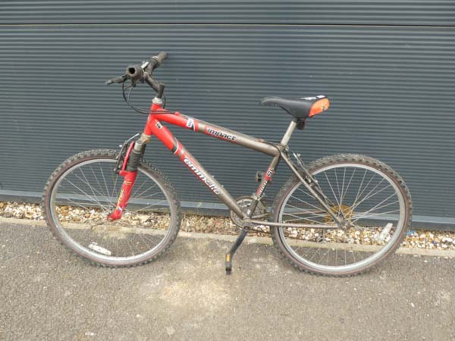 An Emmelle Impact grey/red gents mountain bike