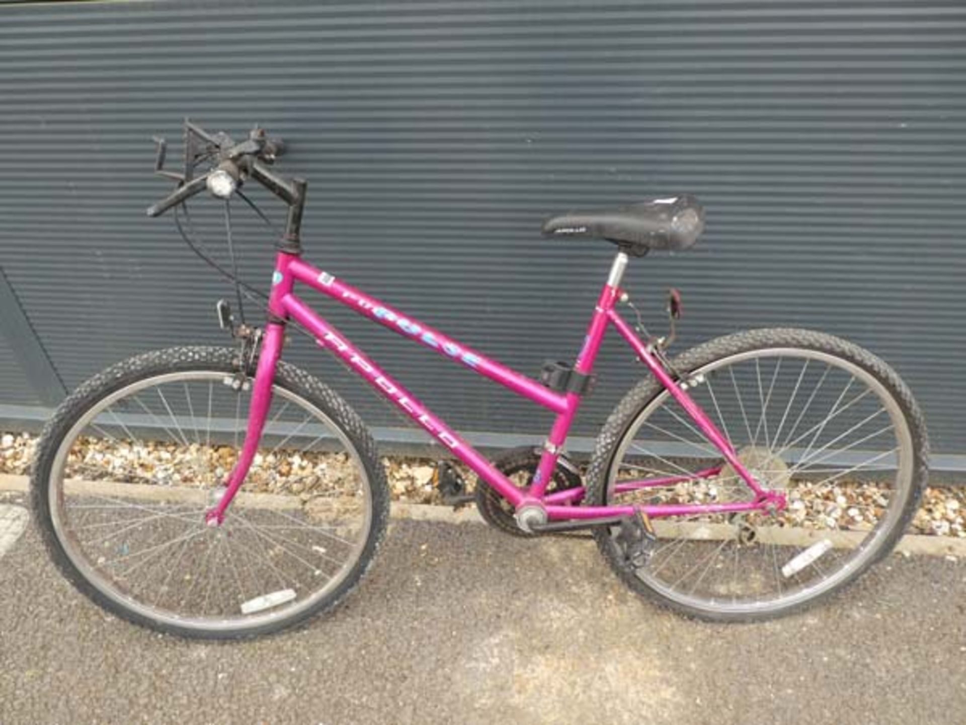 An Apollo Pulse cerise girls mountain bike