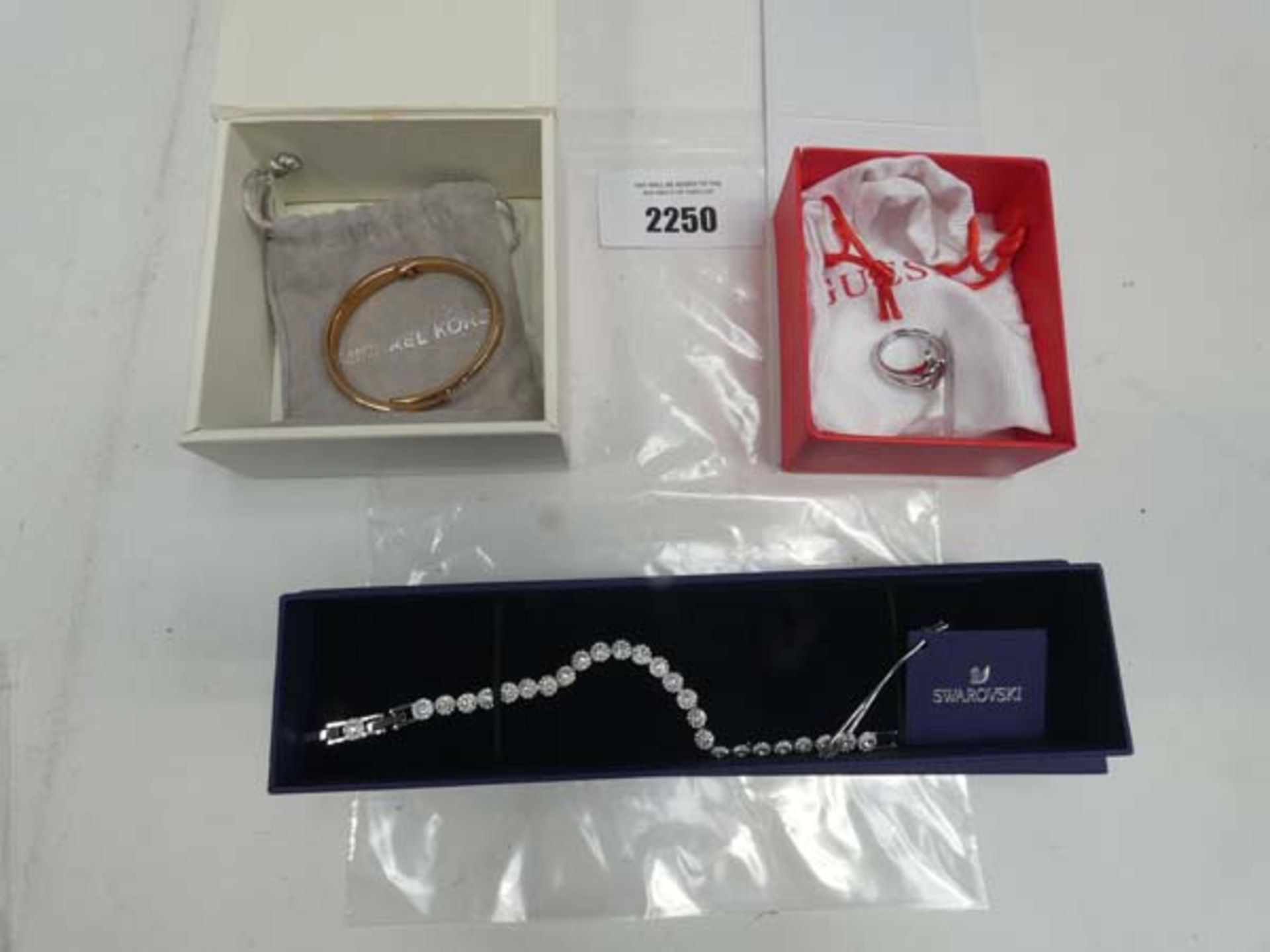 Michael Kors bangle, Guess ring and Swarovski bracelet