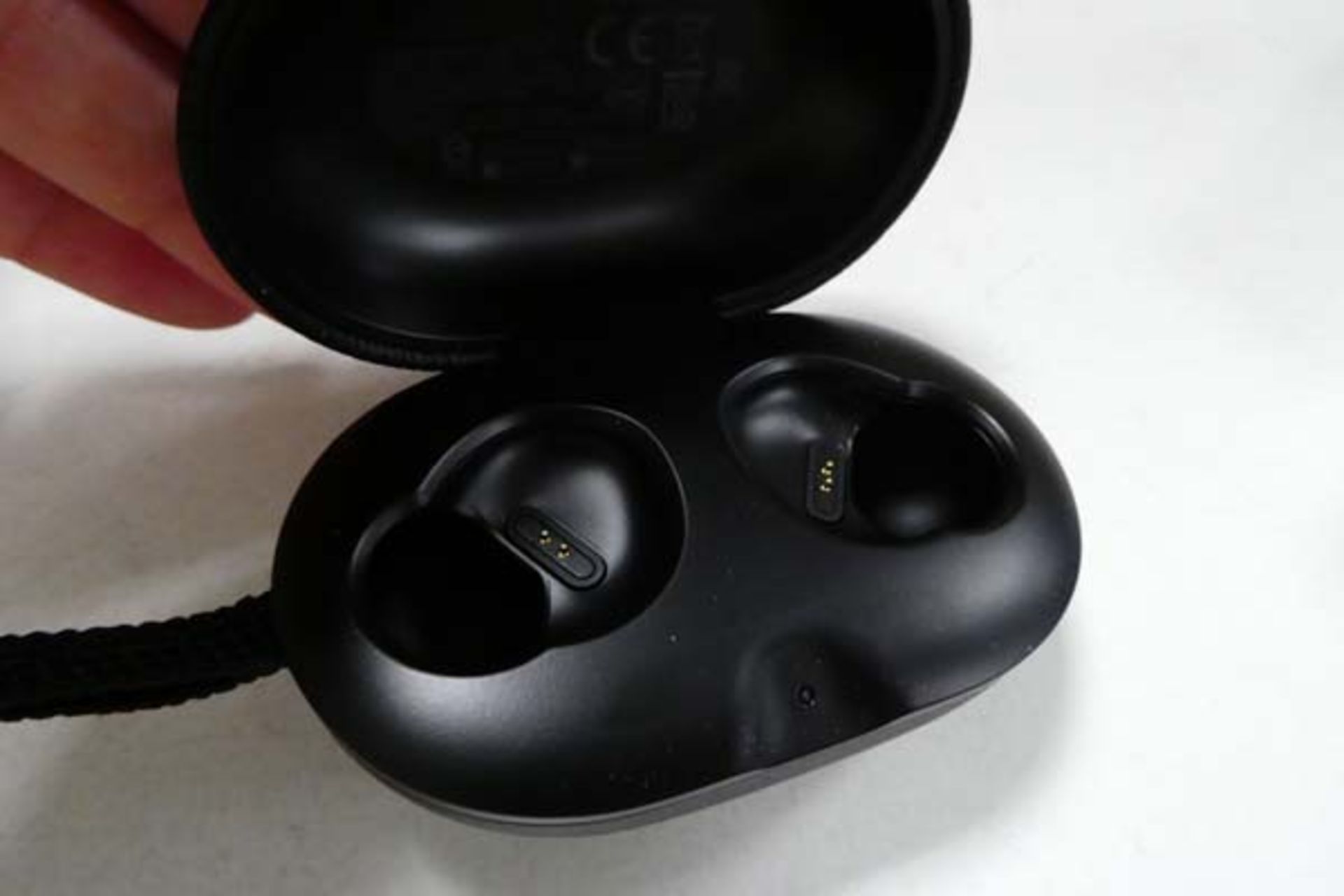 Bang & Olufsen P2 portable bluetooth speaker along with a Bang & Olufsen E8 wireless charging case - Image 3 of 4