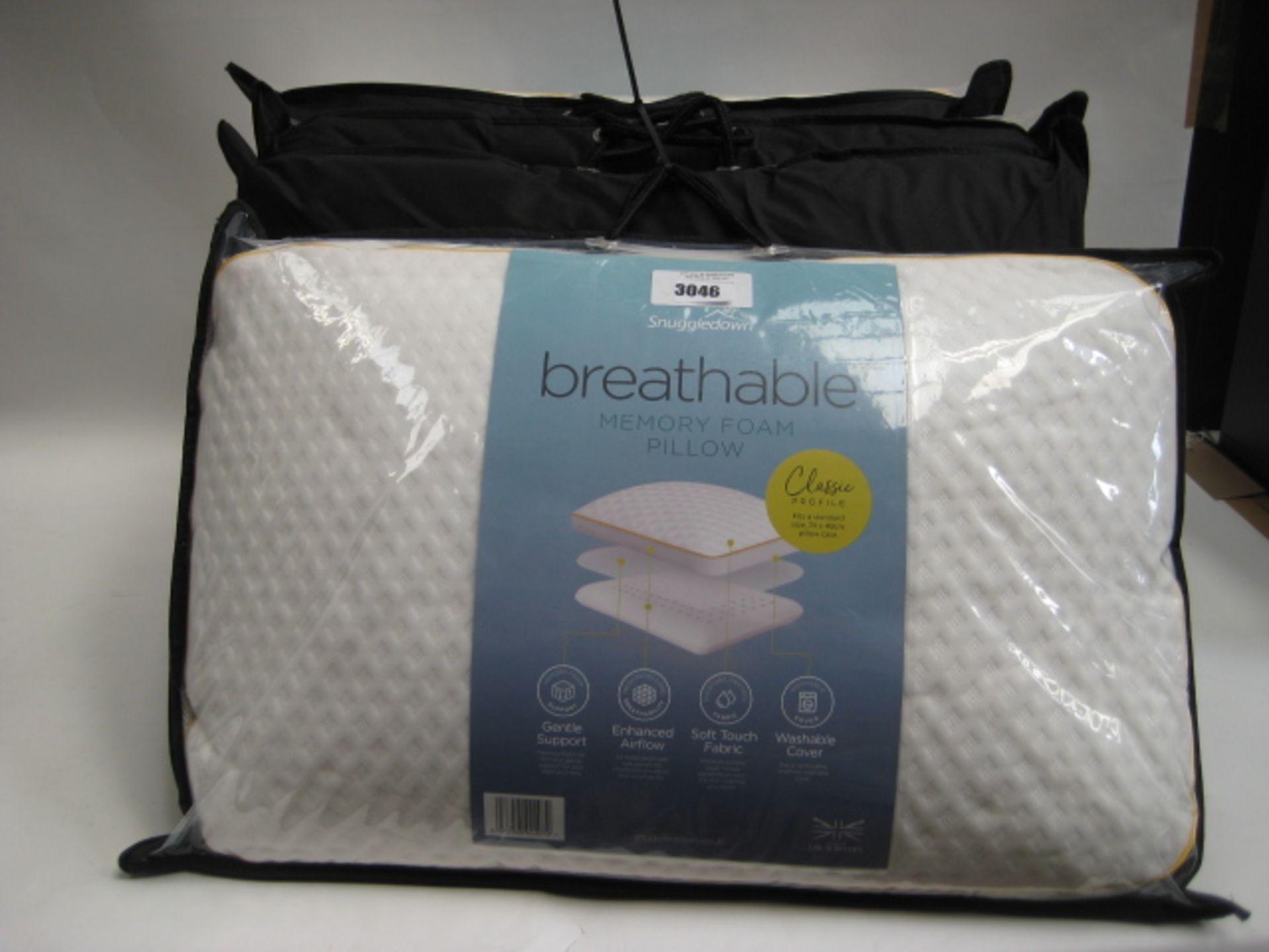 Four bagged Snuggle Down breathable memory foam pillows