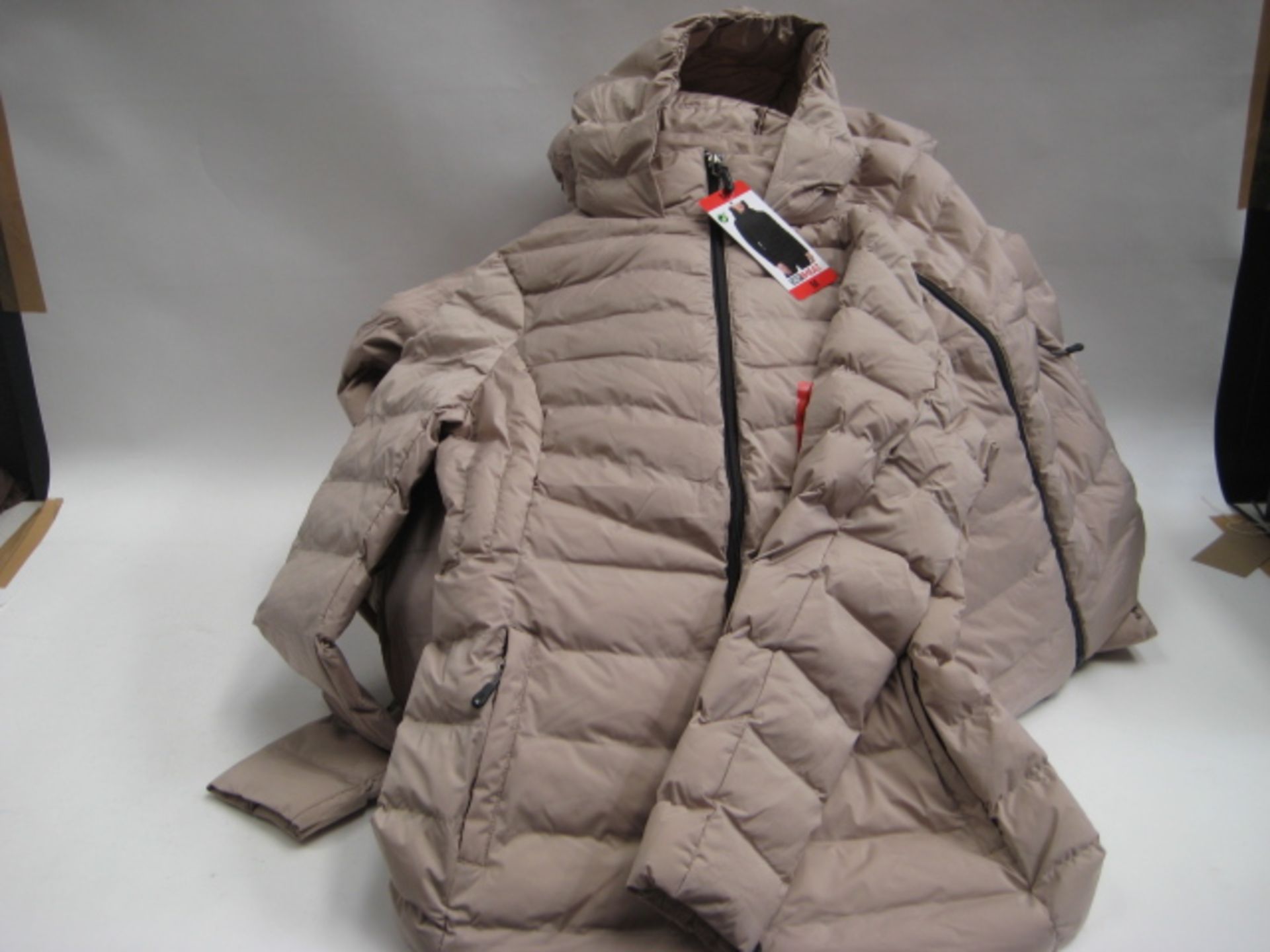 Bag containing 9 ladies light weight hooded quilted jackets in pink, sizes range from small to large